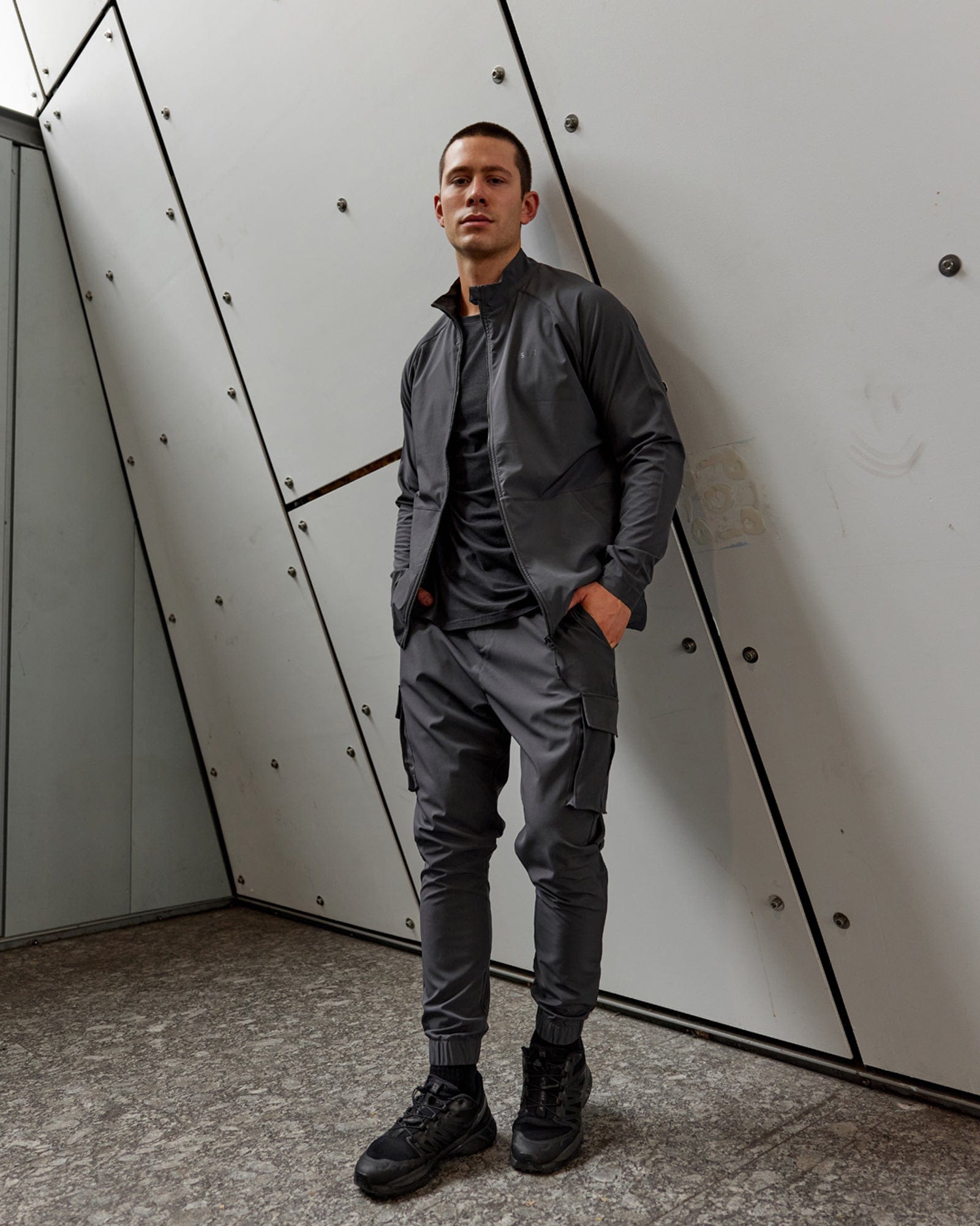 Model wearing Energy Stretch Performance Cargo Jogger - Asphalt