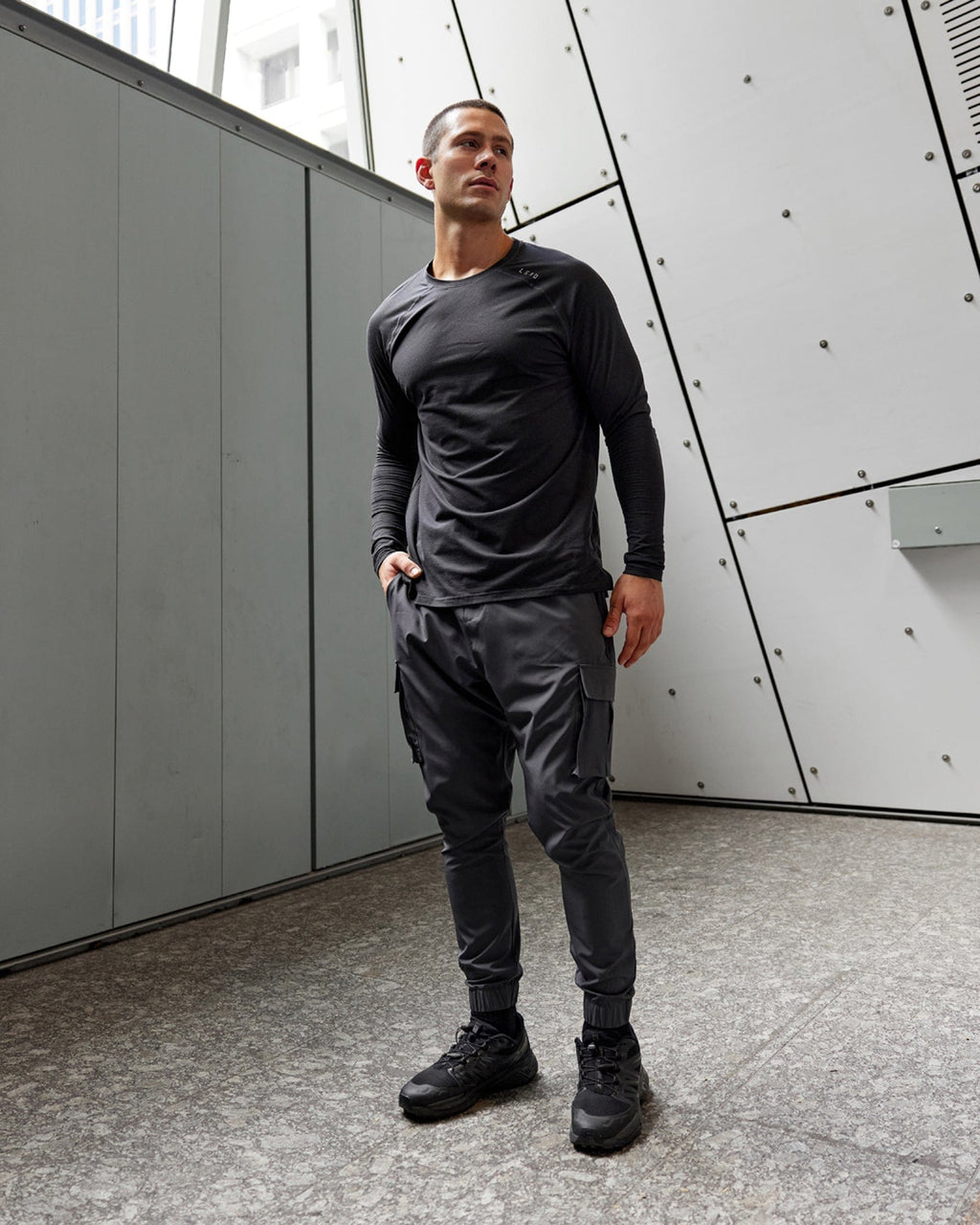 Model wearing Energy Stretch Performance Cargo Jogger - Asphalt