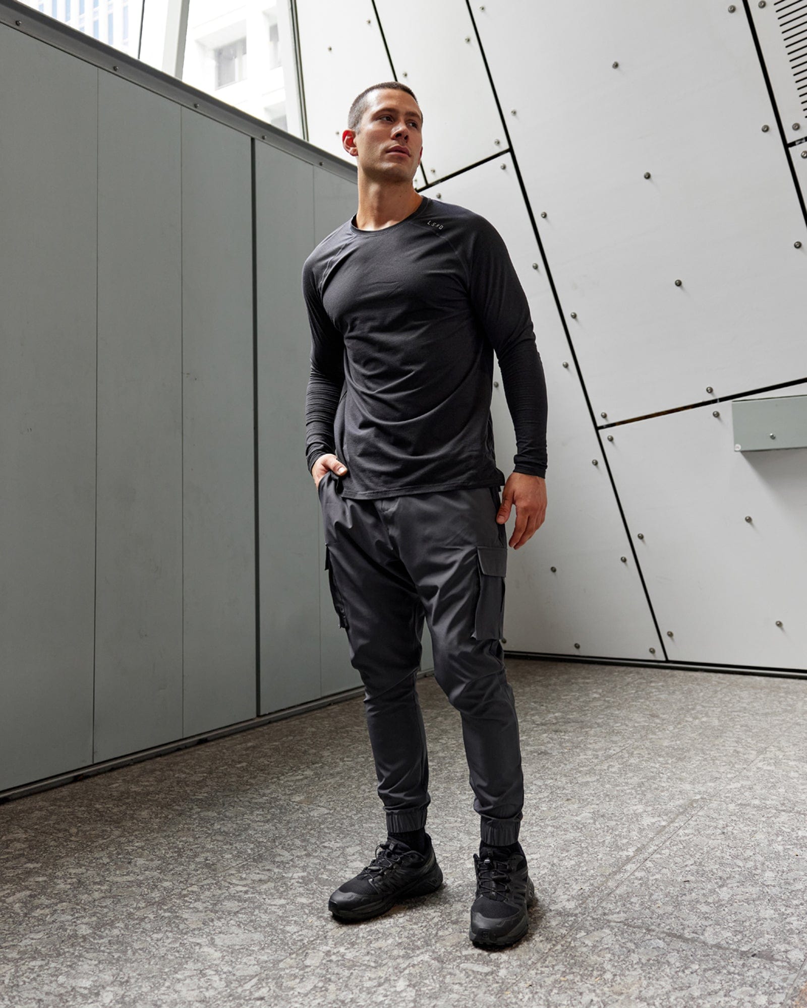Model wearing Energy Stretch Performance Cargo Jogger - Asphalt