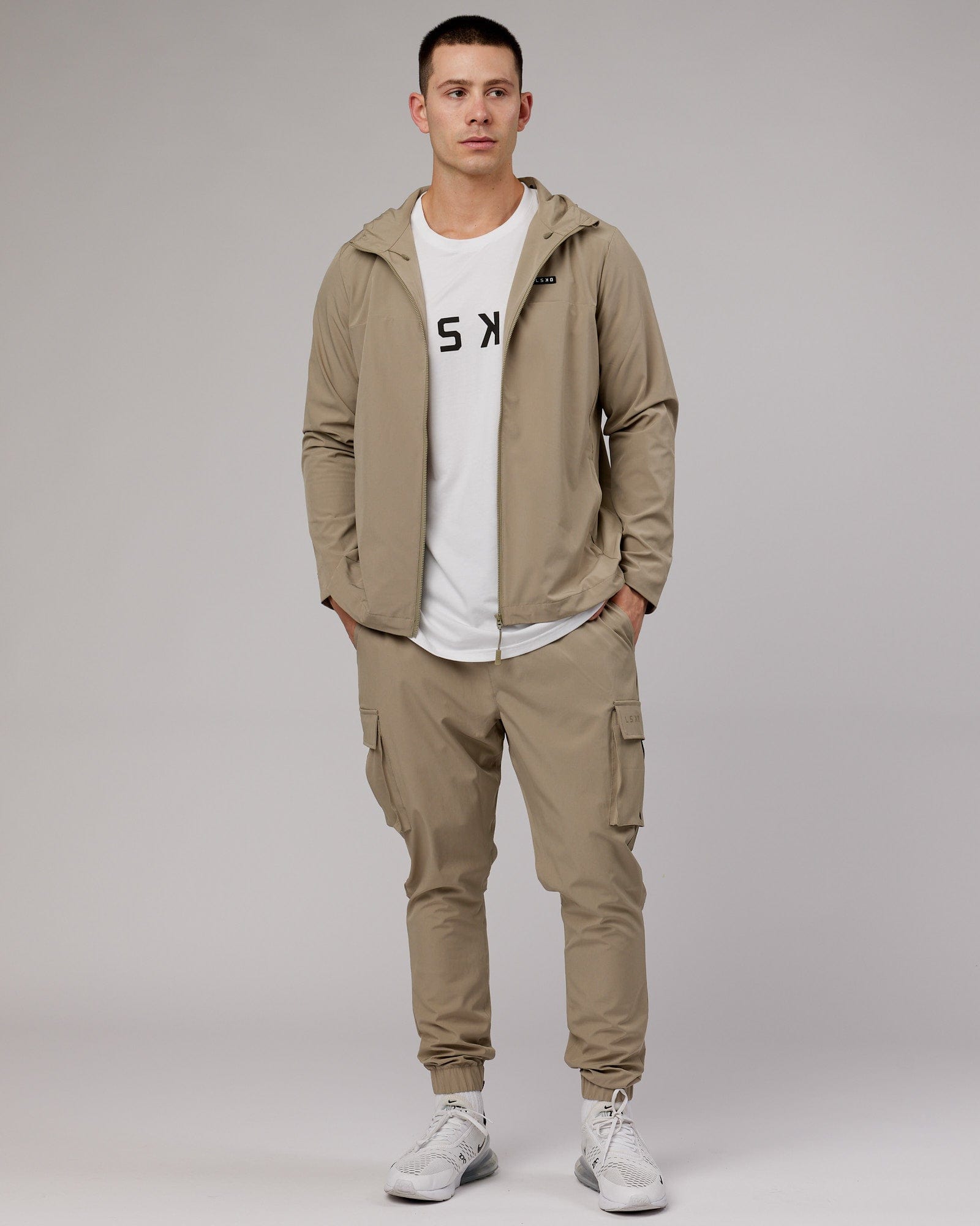 Model wearing Energy Stretch Performance Cargo Jogger - Laurel Oak