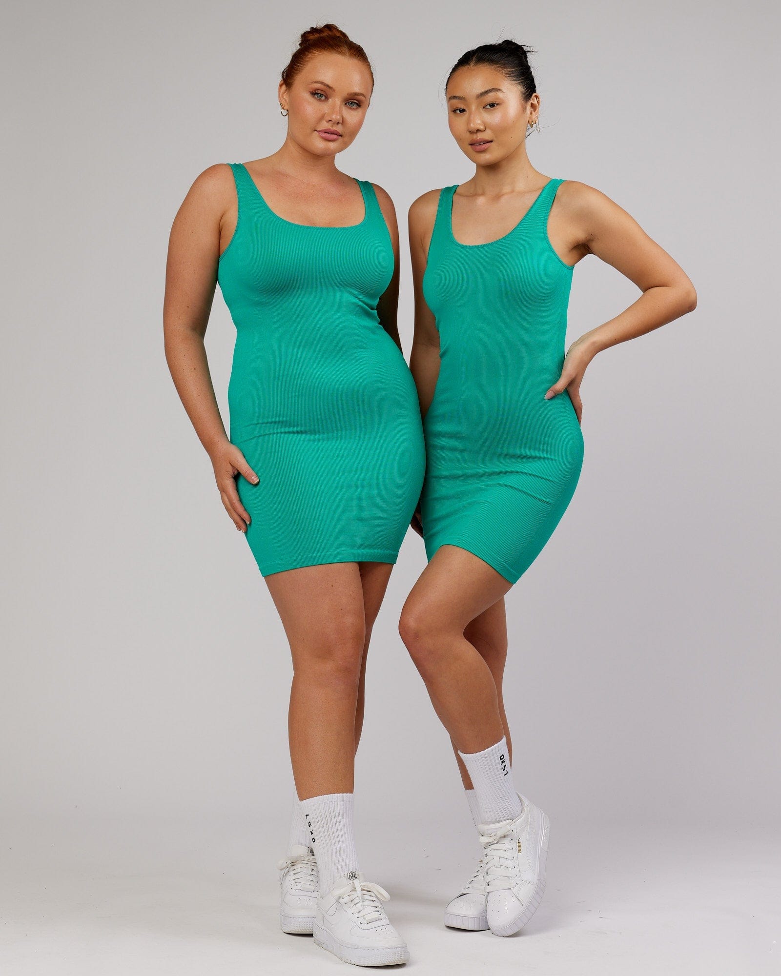 Model wearing Essential Seamless Rib Dress - Hyper Teal