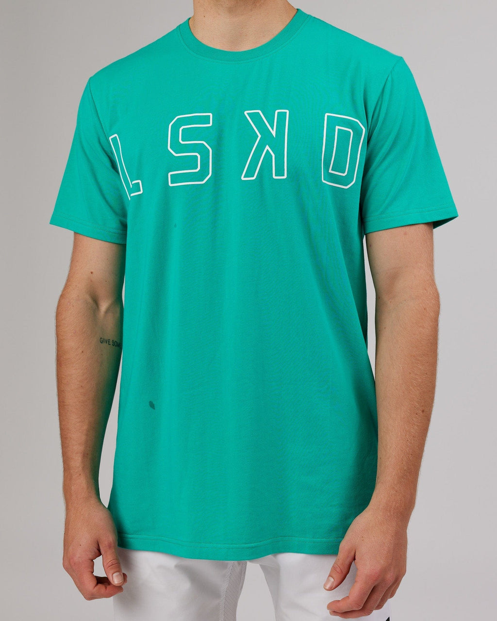 Model wearing Expand FLXCotton Tee - Hyper Teal