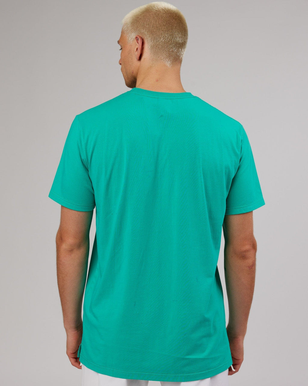 Model wearing Expand FLXCotton Tee - Hyper Teal