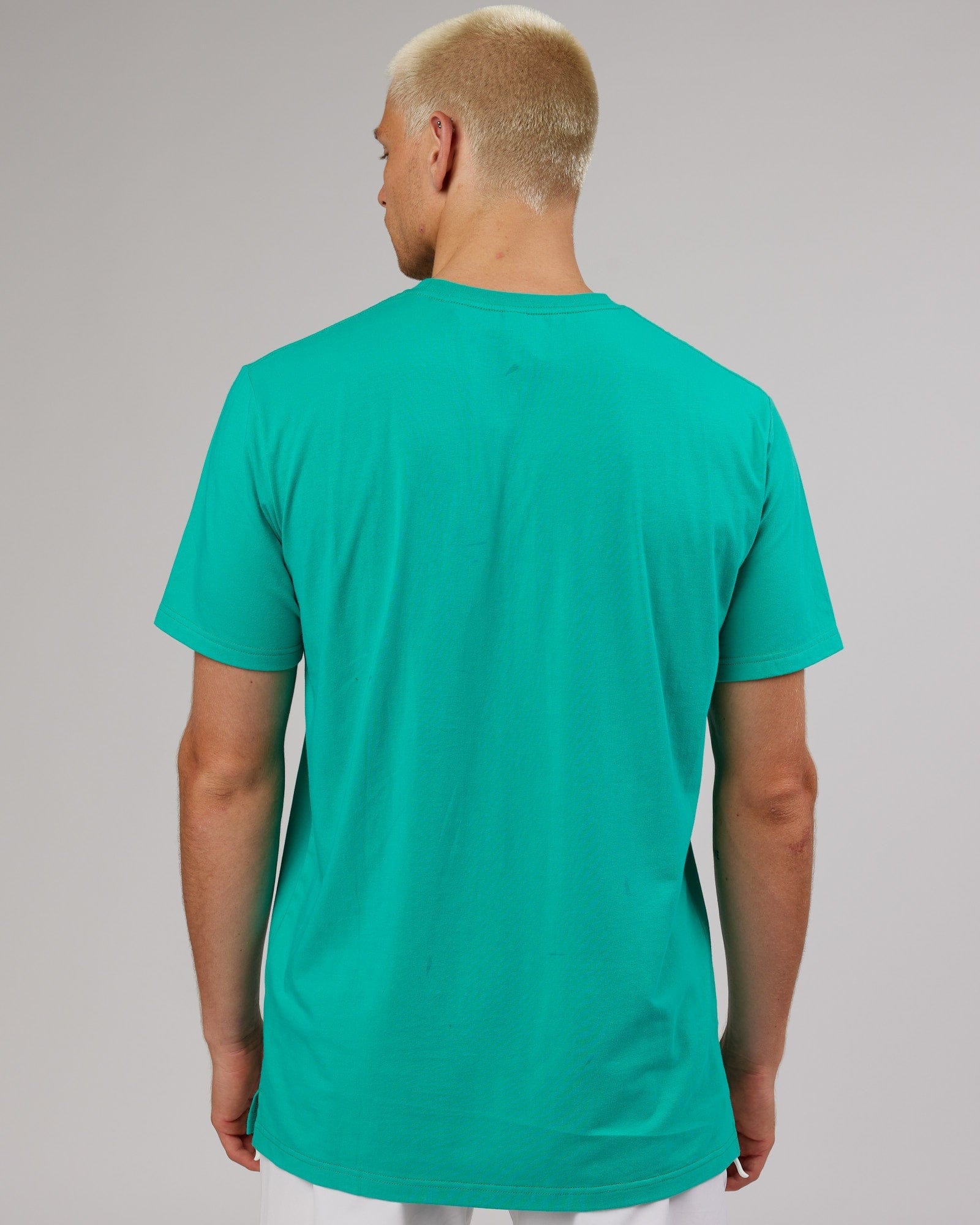 Model wearing Expand FLXCotton Tee - Hyper Teal