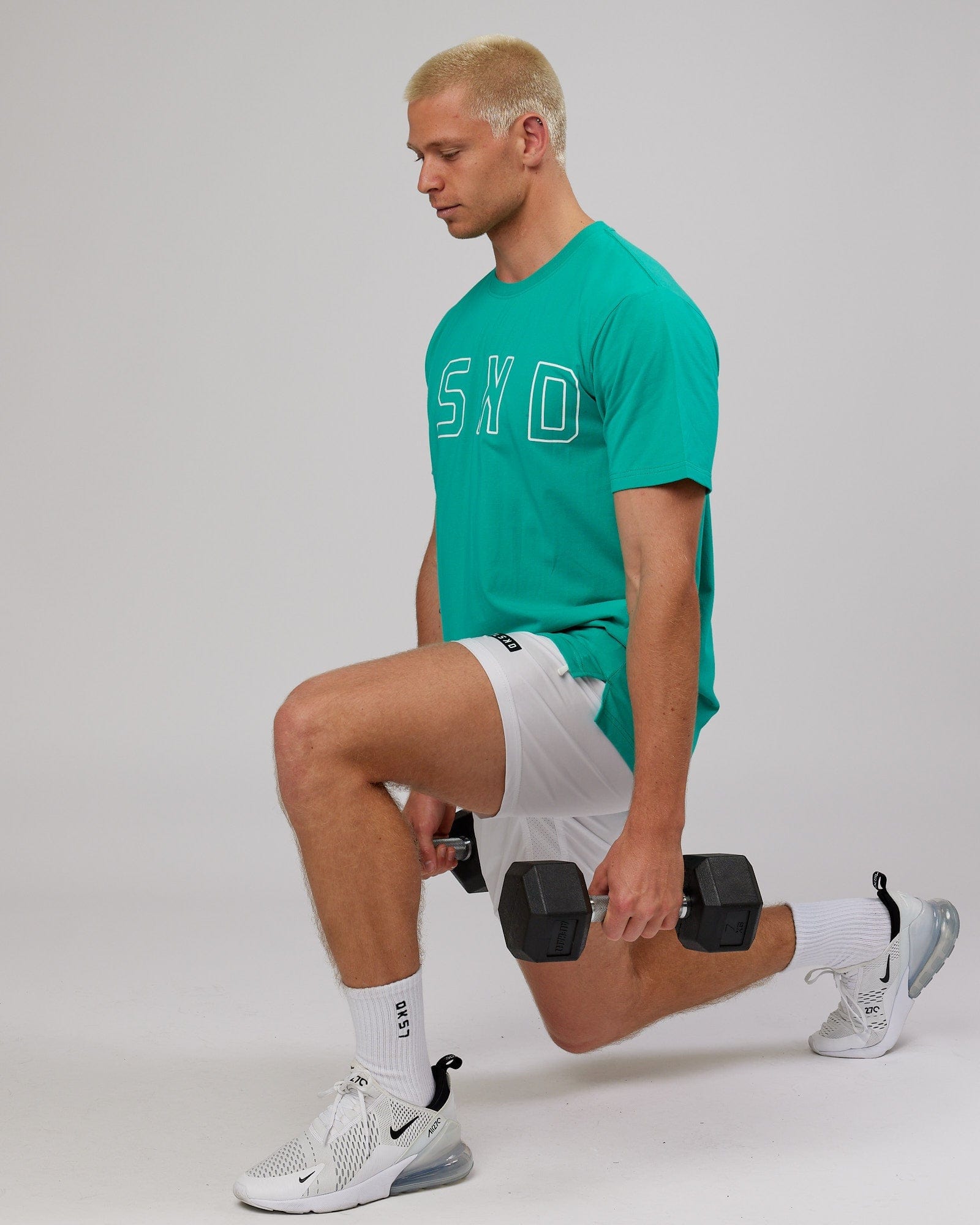 Model wearing Expand FLXCotton Tee - Hyper Teal