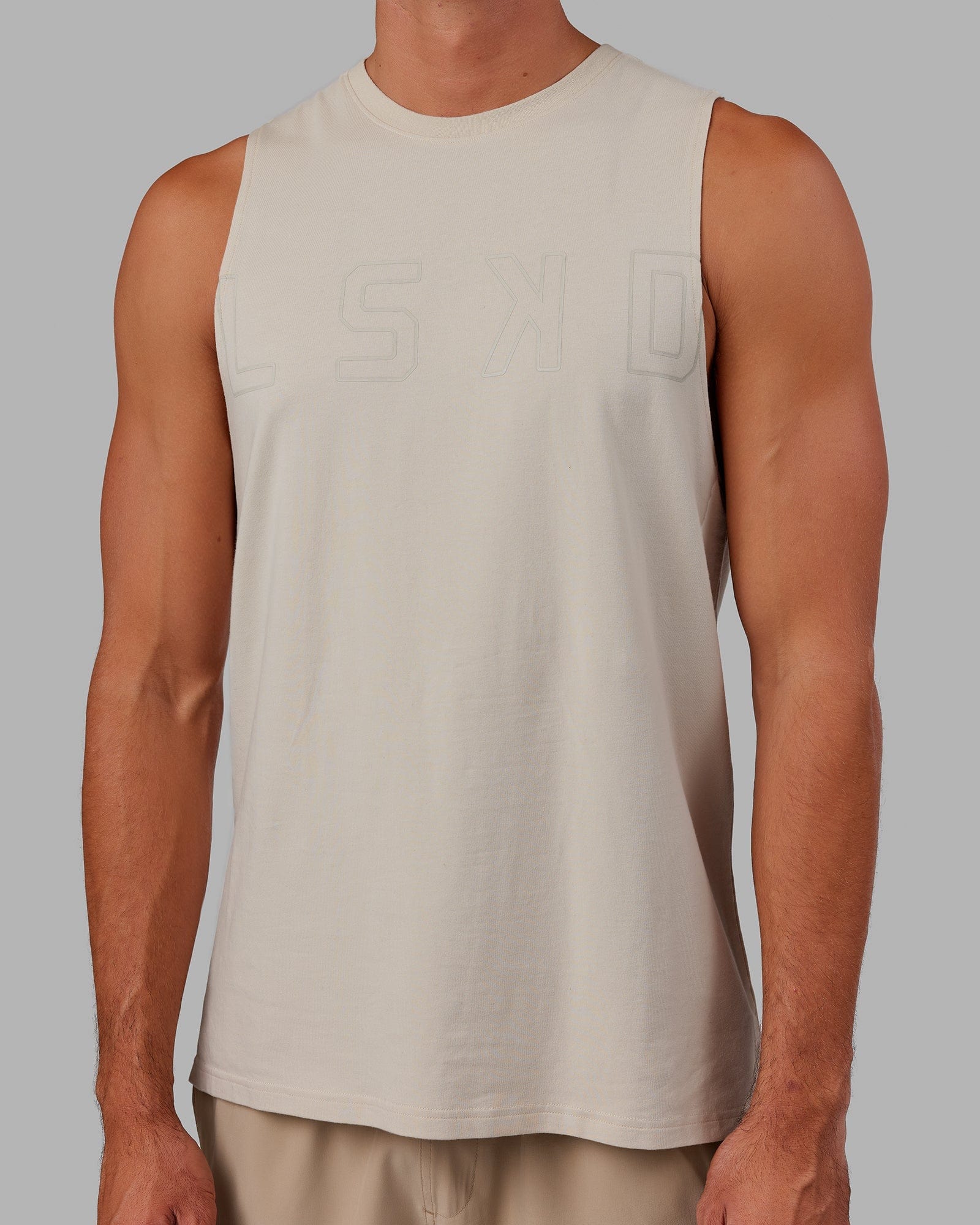 Model wearing Expand FLXCotton Training Fit Tank - Bone-Bone