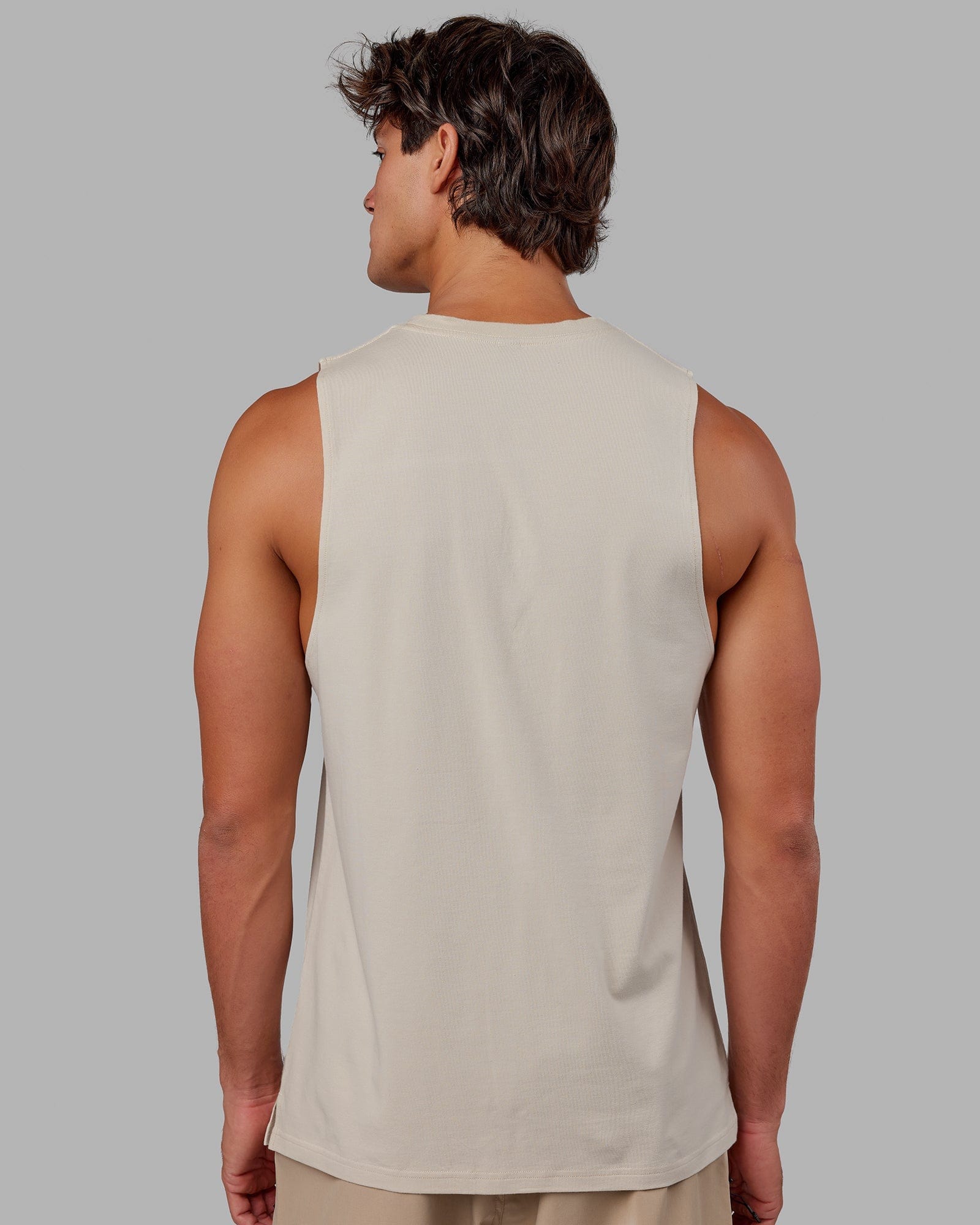 Model wearing Expand FLXCotton Training Fit Tank - Bone-Bone