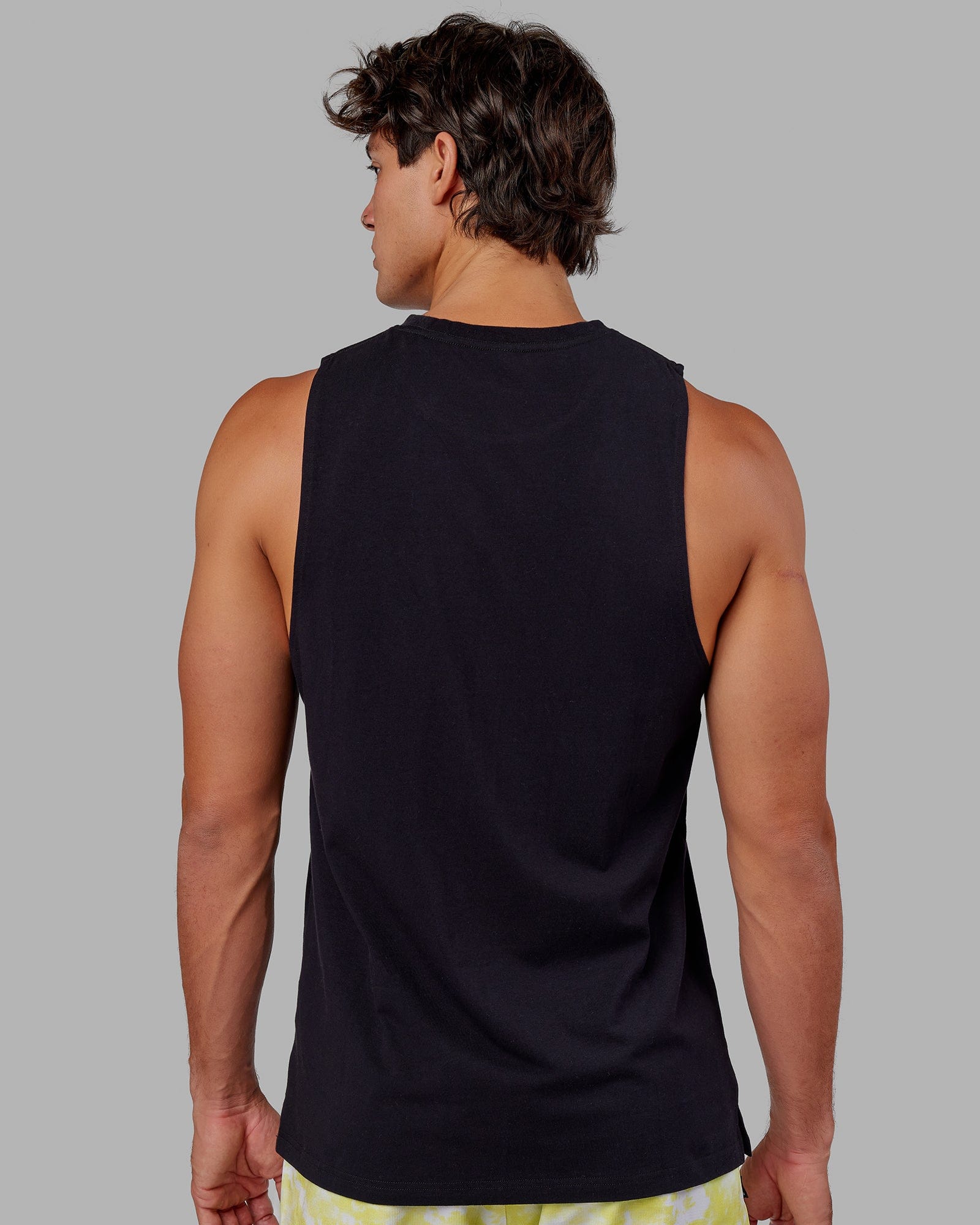 Model wearing Expand FLXCotton Training Fit Tank - Black-Citrus Green