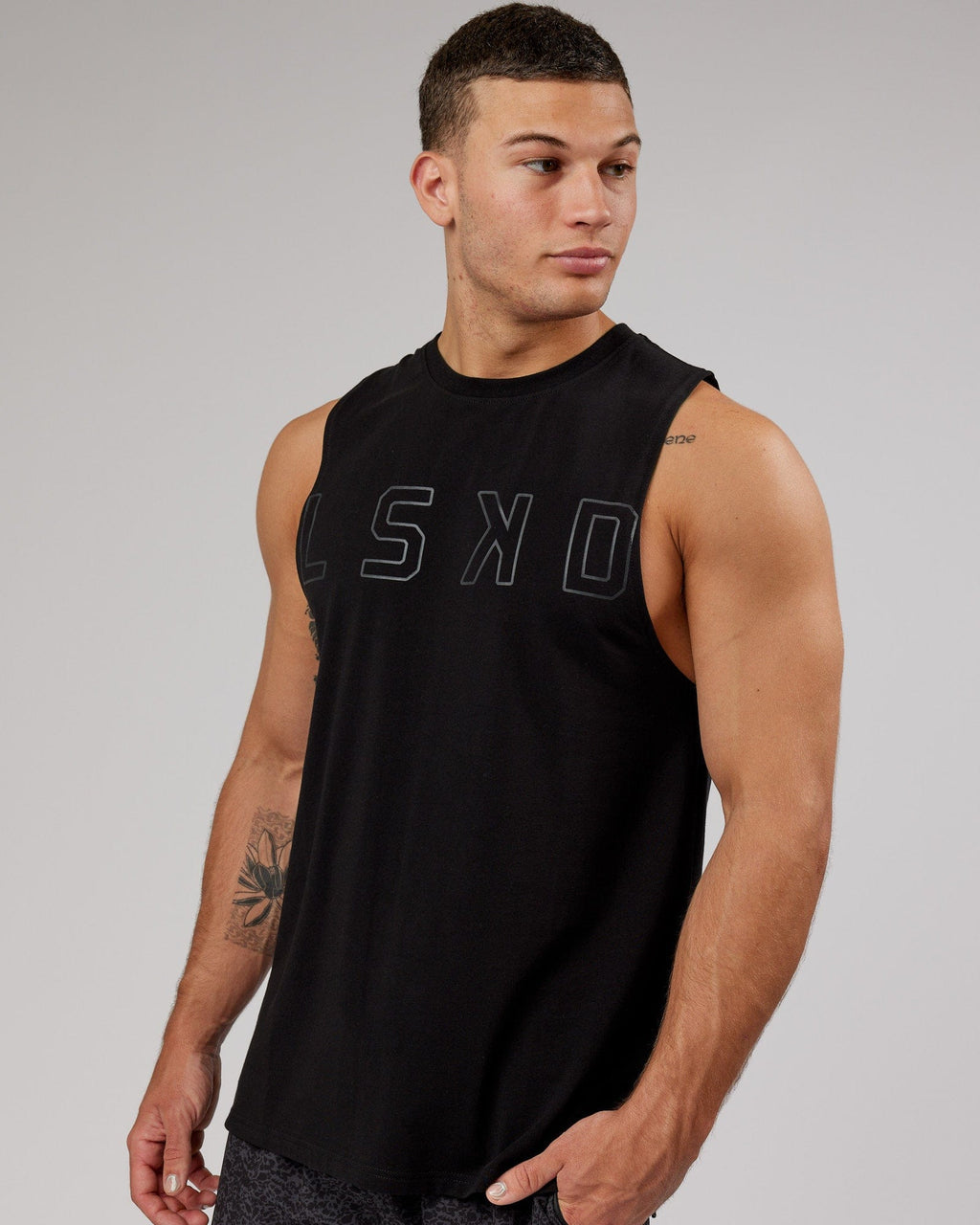 Model wearing Expand FLXCotton Training Fit Tank - Black-Black