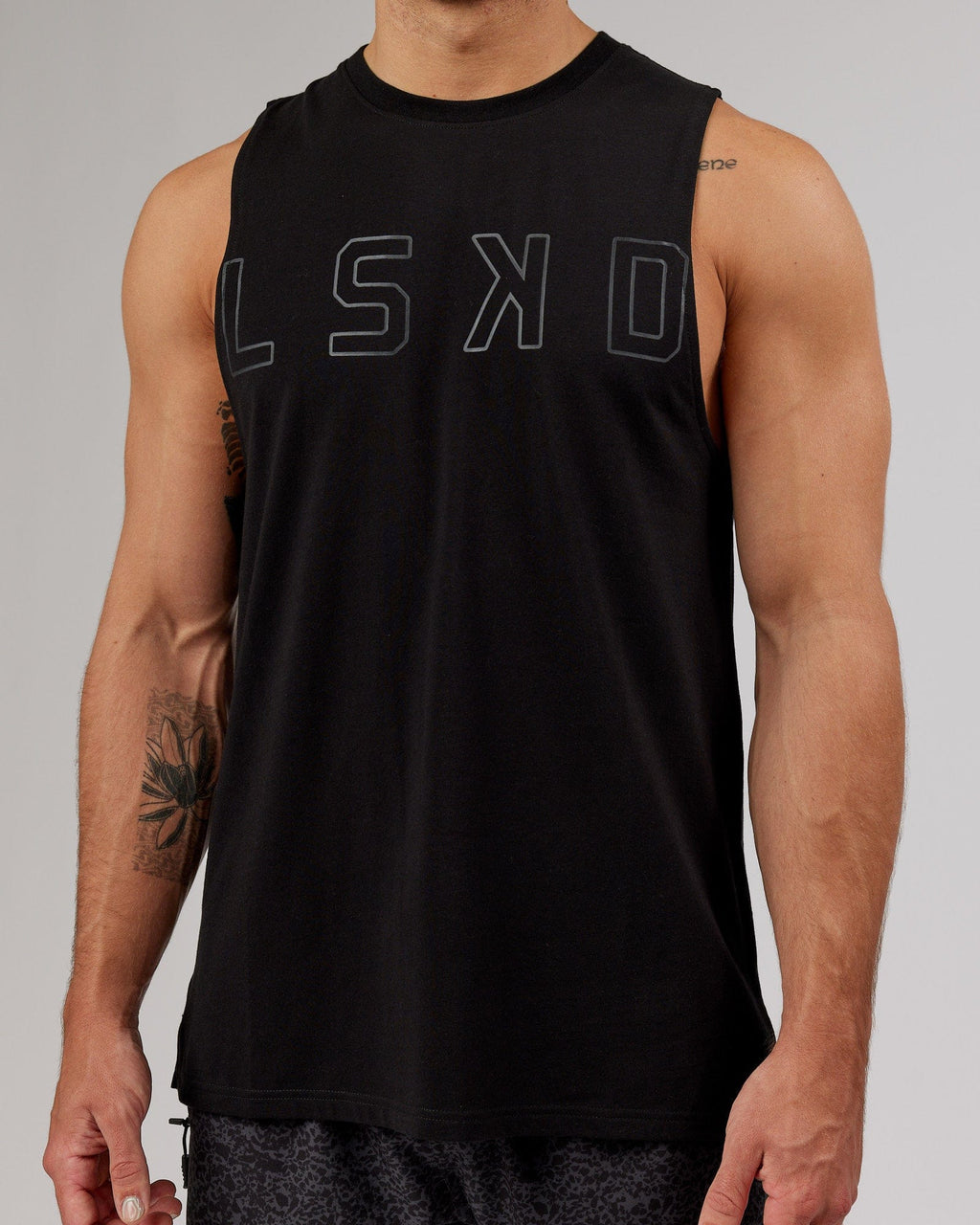 Model wearing Expand FLXCotton Training Fit Tank - Black-Black