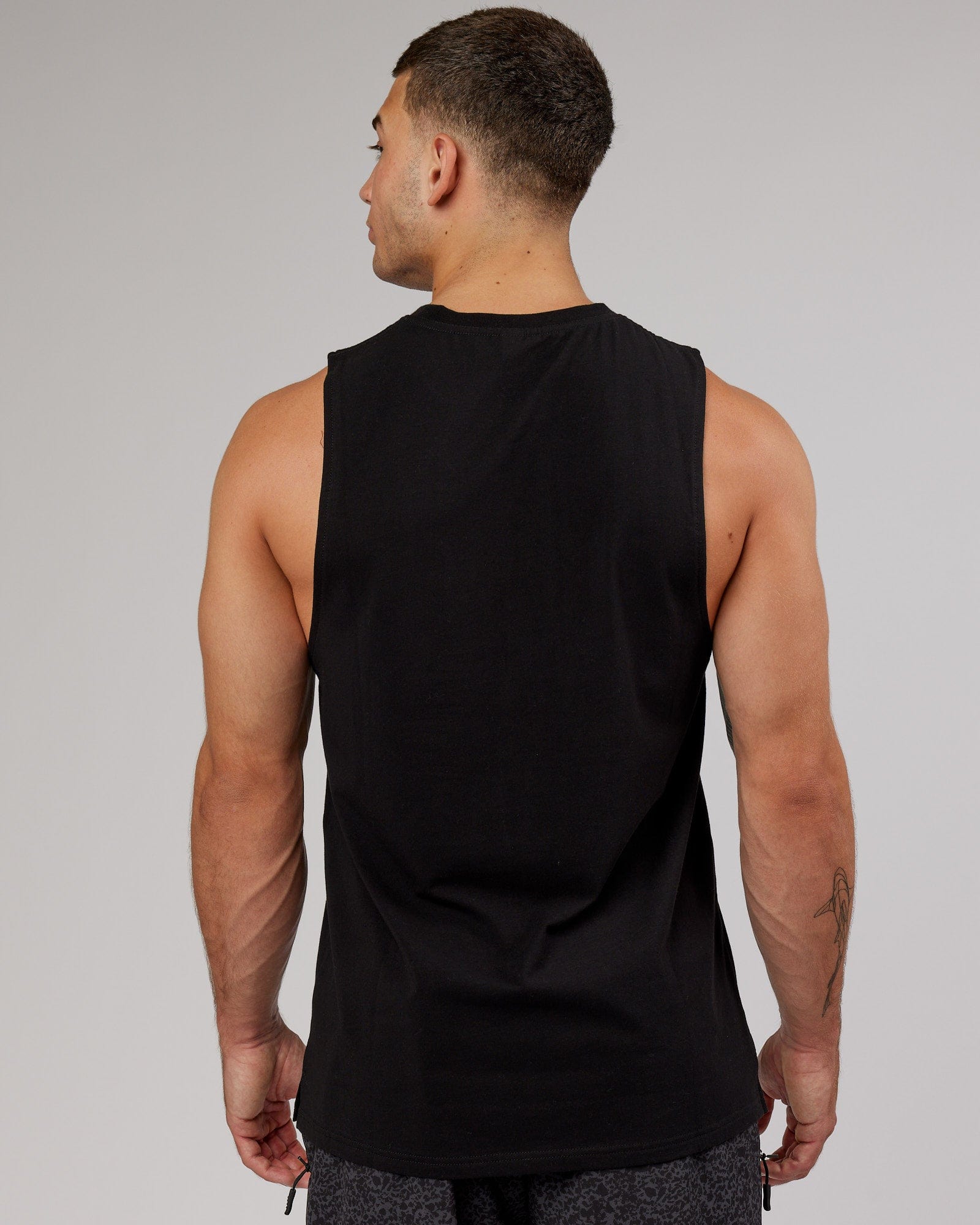 Model wearing Expand FLXCotton Training Fit Tank - Black-Black