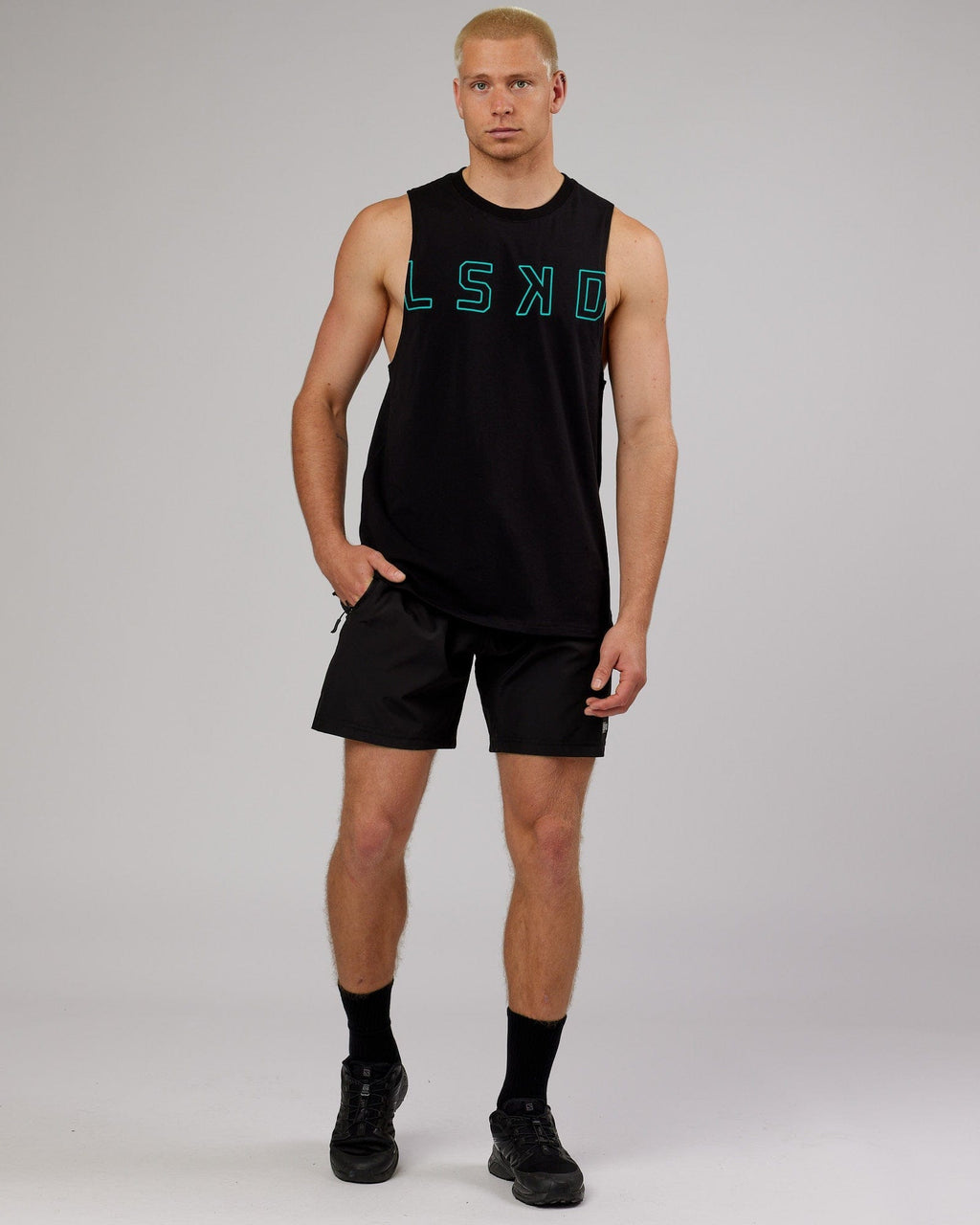 Model wearing Expand FLXCotton Training Fit Tank - Black-Hyper Teal