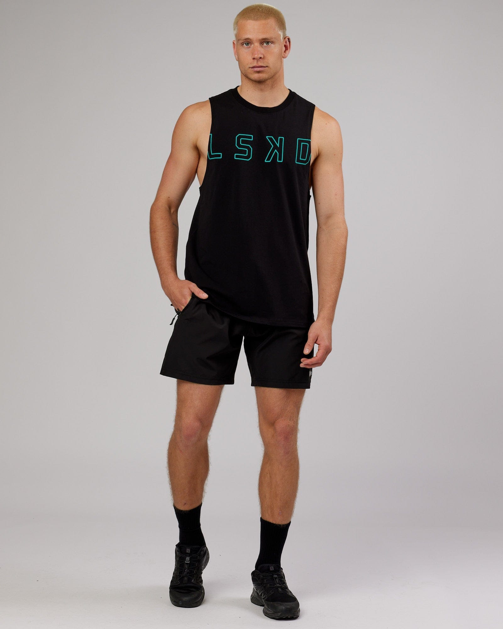 Model wearing Expand FLXCotton Training Fit Tank - Black-Hyper Teal