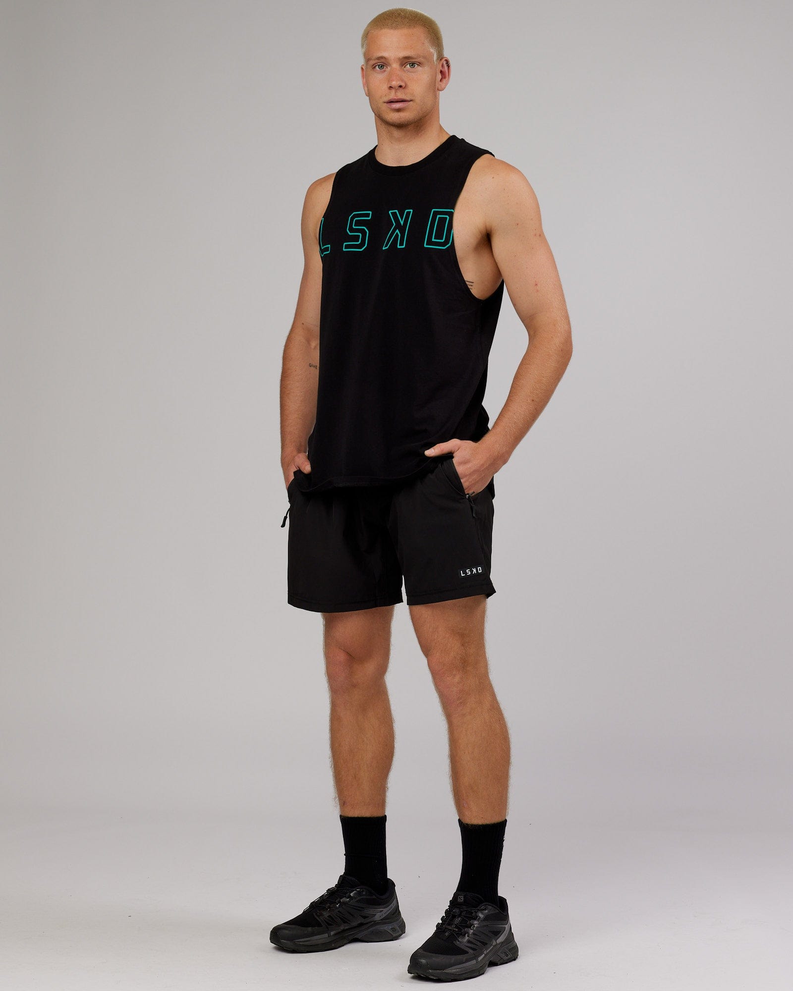 Model wearing Expand FLXCotton Training Fit Tank - Black-Hyper Teal