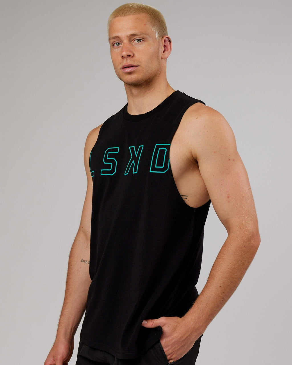 Model wearing Expand FLXCotton Training Fit Tank - Black-Hyper Teal