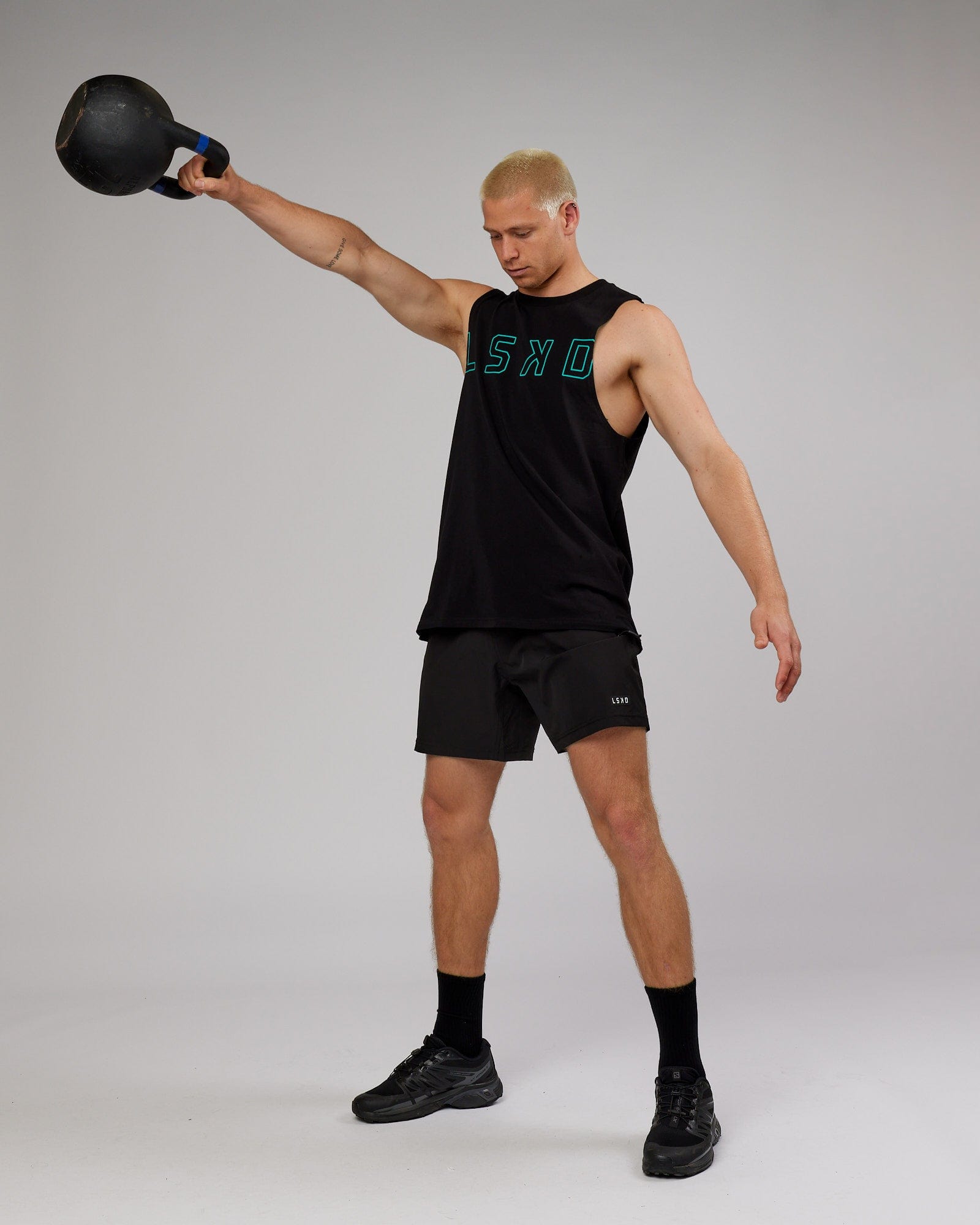 Model wearing Expand FLXCotton Training Fit Tank - Black-Hyper Teal