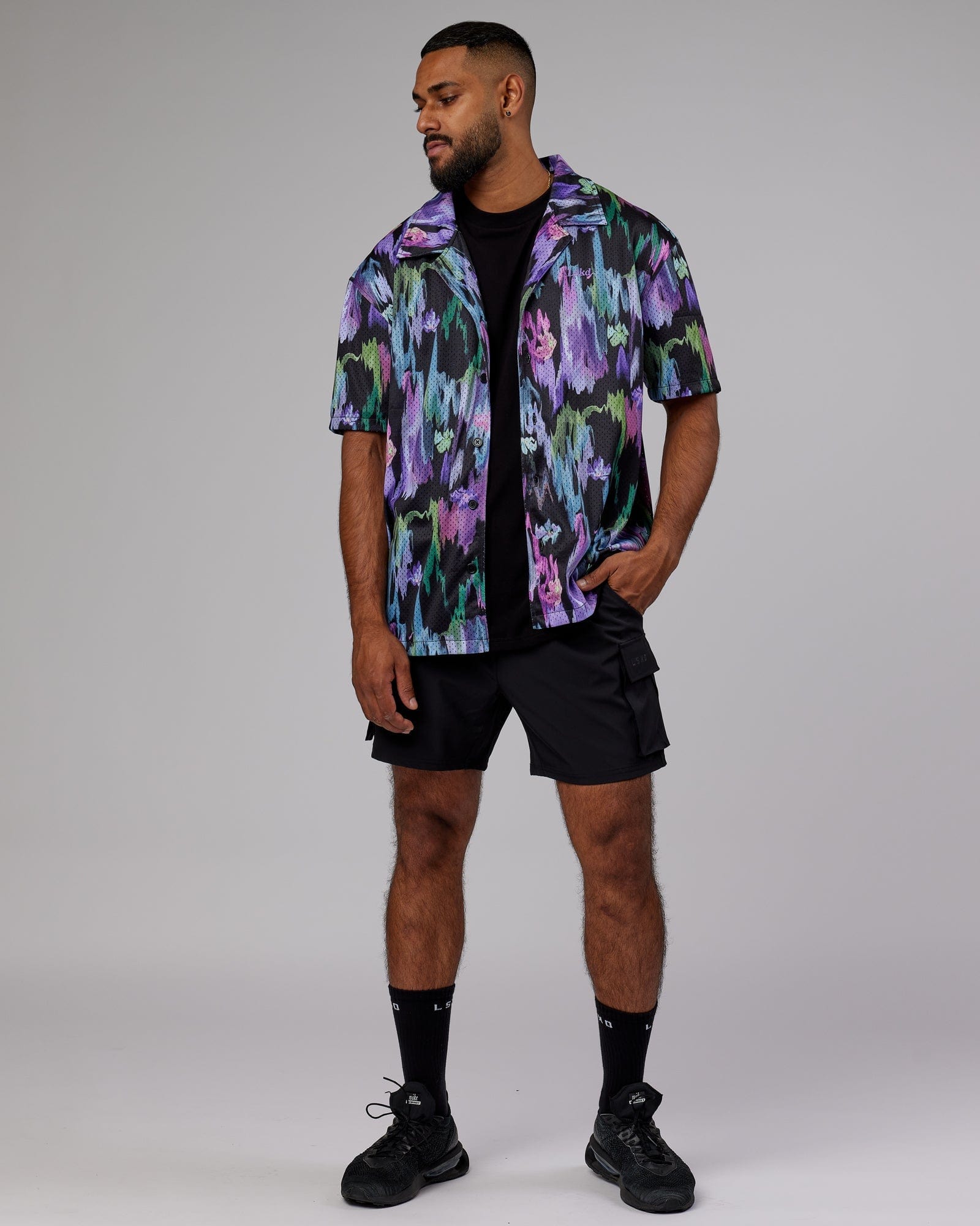 Model wearing Expression Short Sleeve Mesh Shirt - Hyper Floral Black