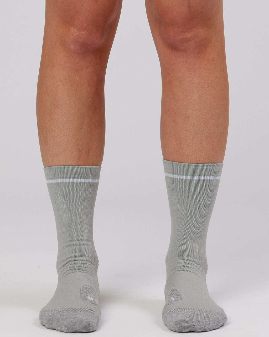 Model wearing Fast Performance Sock - Light Grey Marl