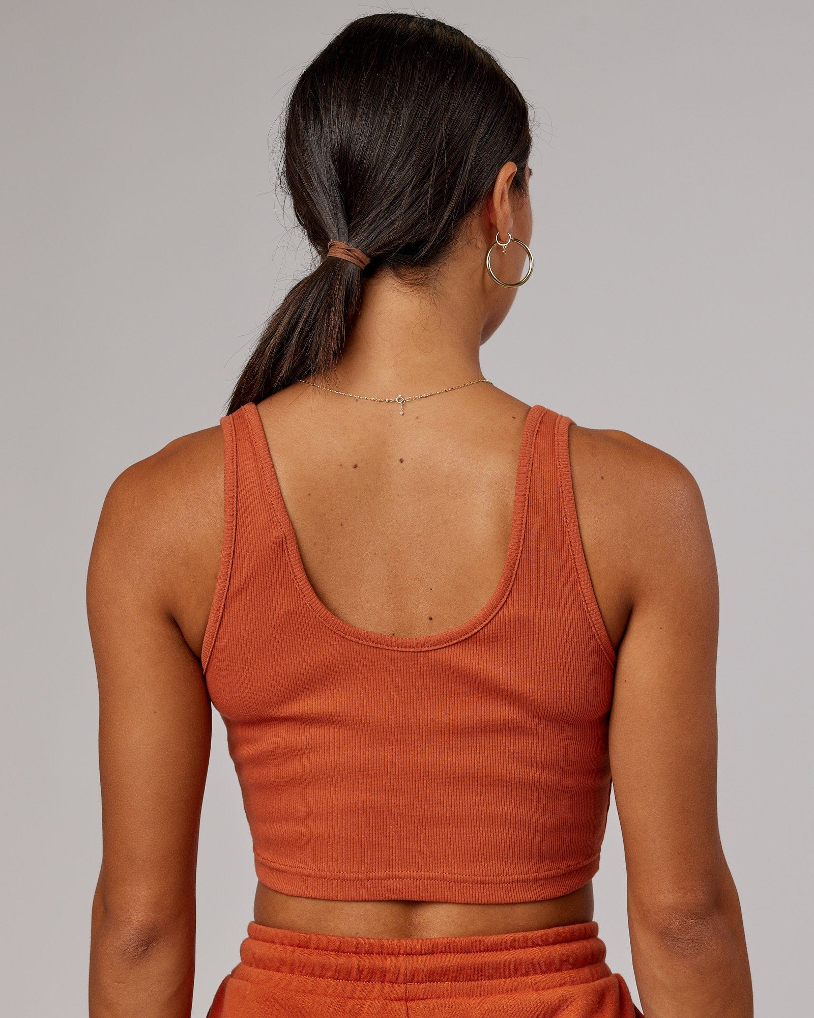 Model wearing Field Ribbed V-Neck Tank - Auburn