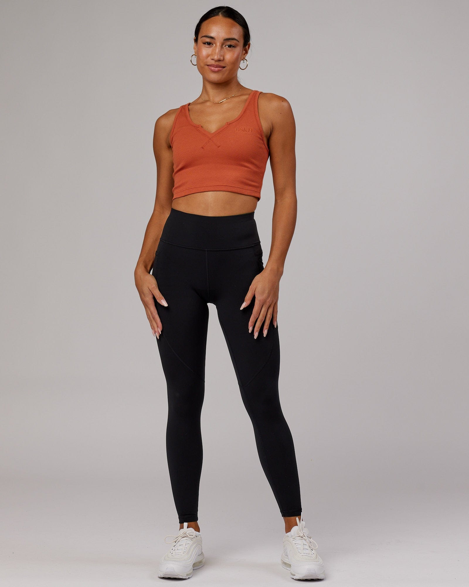 Model wearing Field Ribbed V-Neck Tank - Auburn