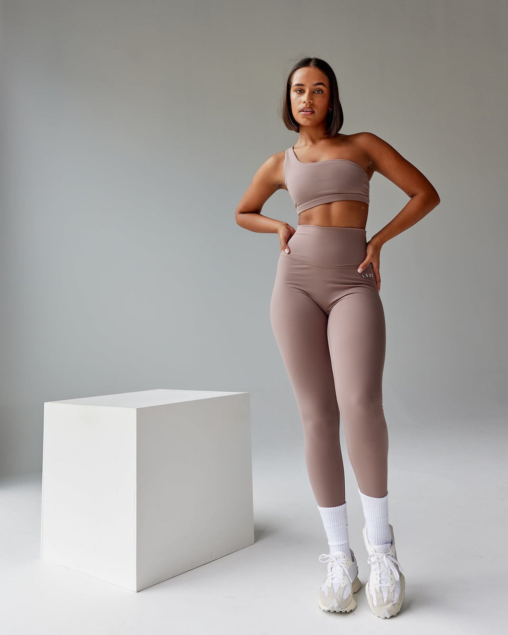 Model wearing Flex Sports Bra - Deep Taupe