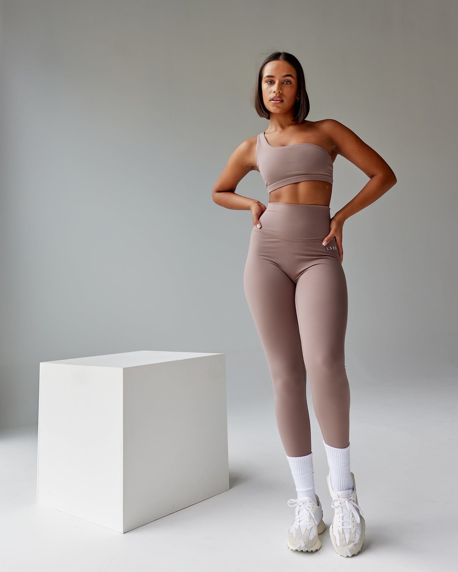 Model wearing Flex Sports Bra - Deep Taupe