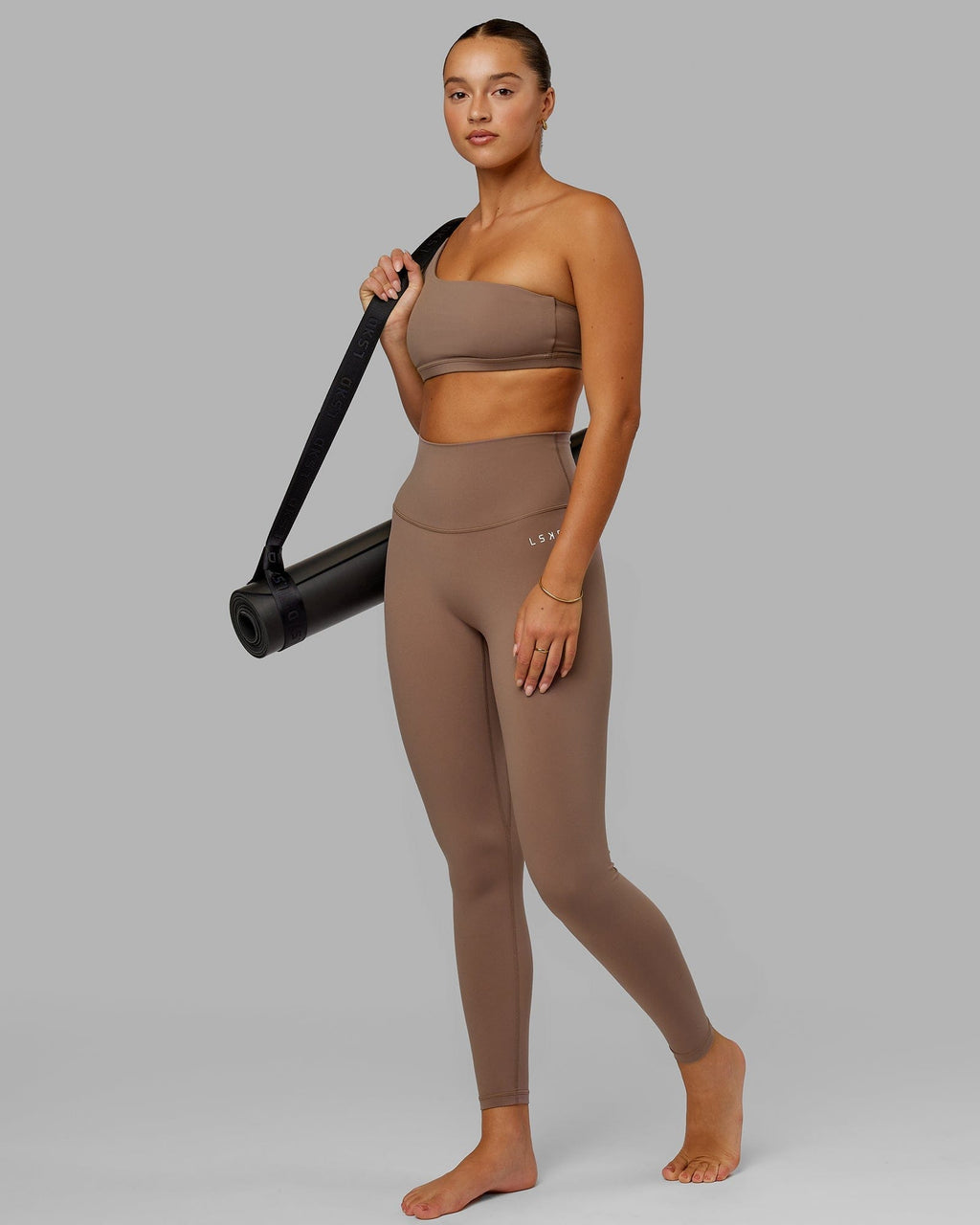 Model wearing Flex Sports Bra - Deep Taupe