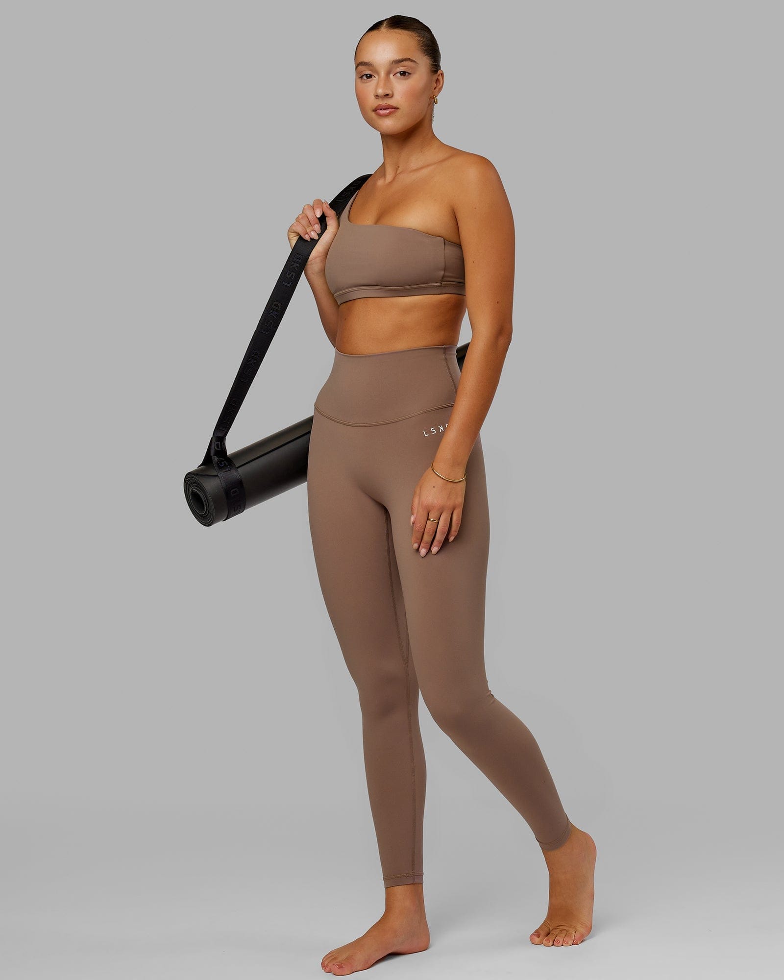 Model wearing Flex Sports Bra - Deep Taupe