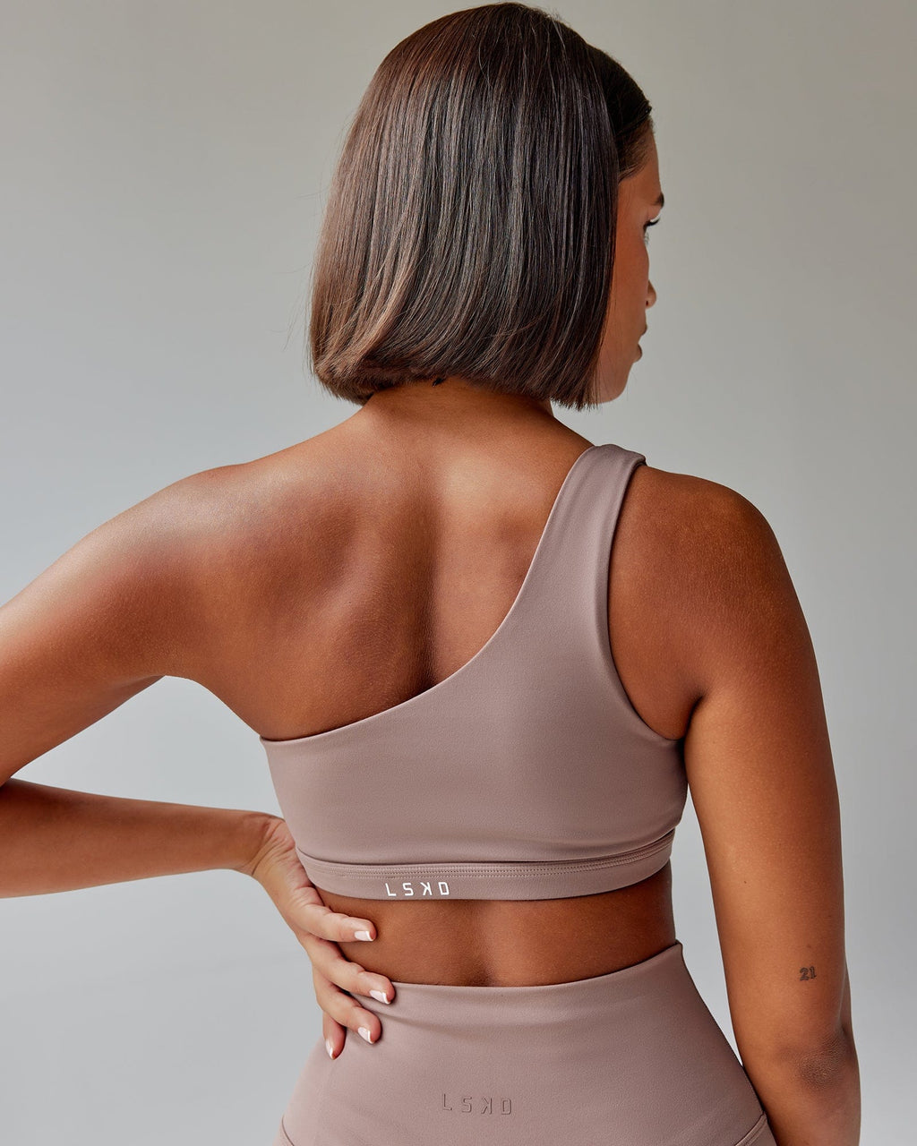 Model wearing Flex Sports Bra - Deep Taupe