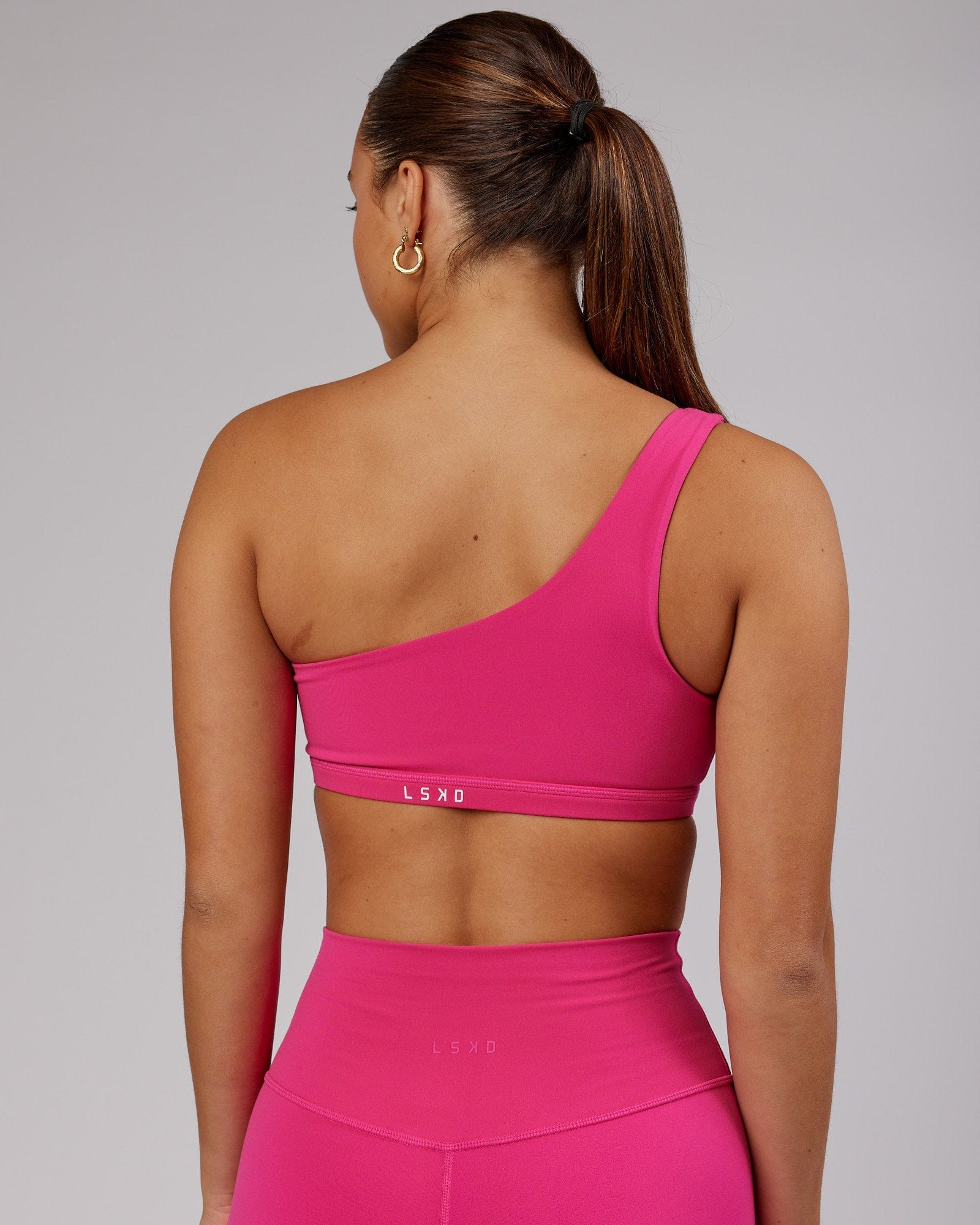 Model wearing Flex Sports Bra - Magenta