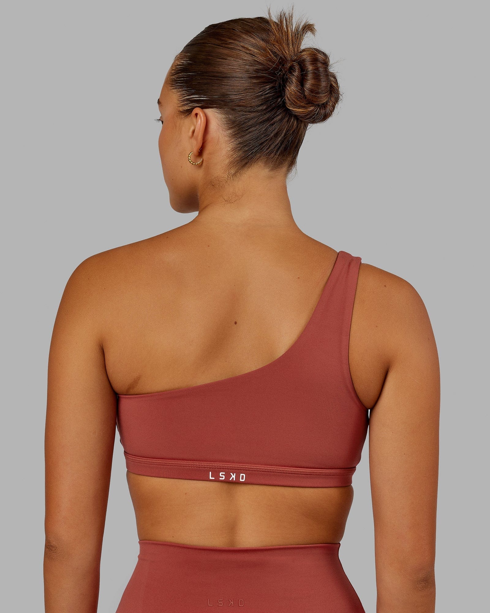 Model wearing Flex Sports Bra - Paprika