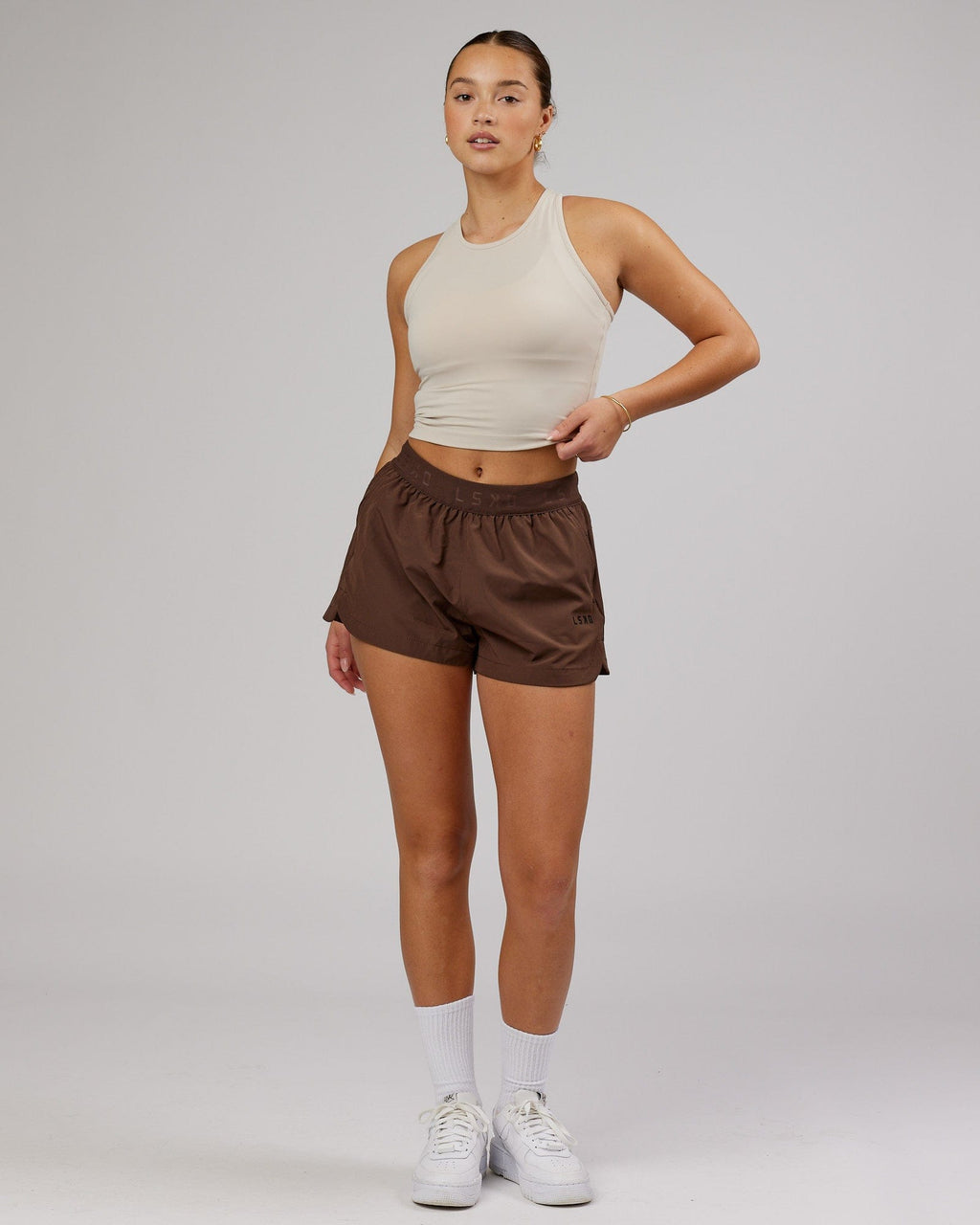 Model wearing Flow Performance Tank - Silver Grey