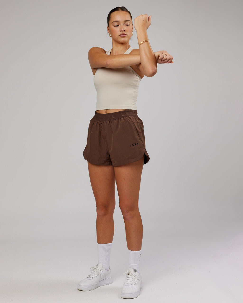 Model wearing Flow Performance Tank - Silver Grey