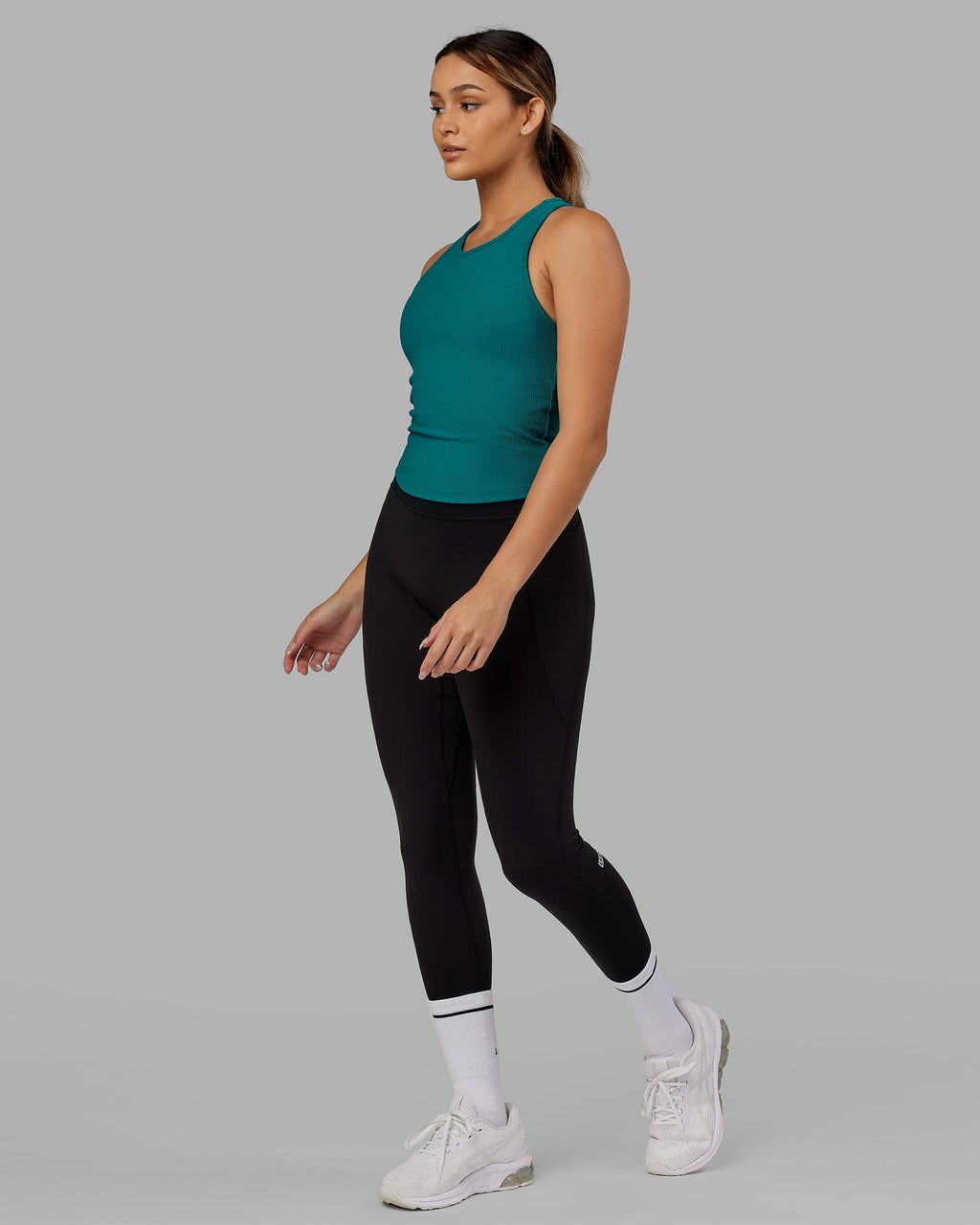 Model wearing Flow Ribbed Shelf Bra Performance Tank - Sea Green