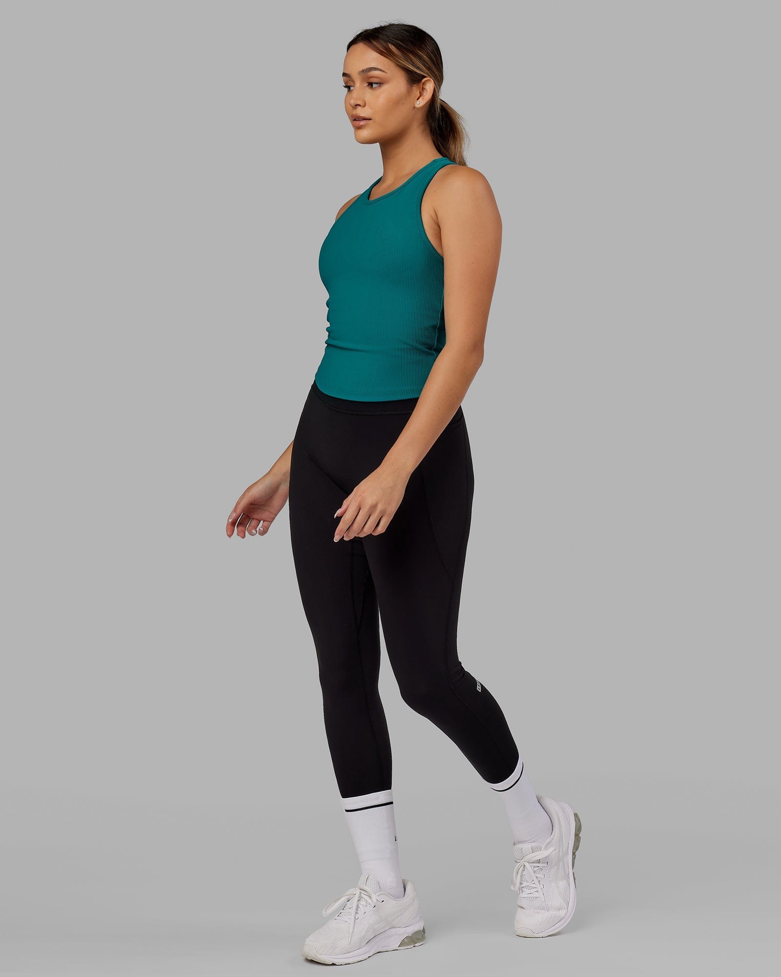 Model wearing Flow Ribbed Shelf Bra Performance Tank - Sea Green