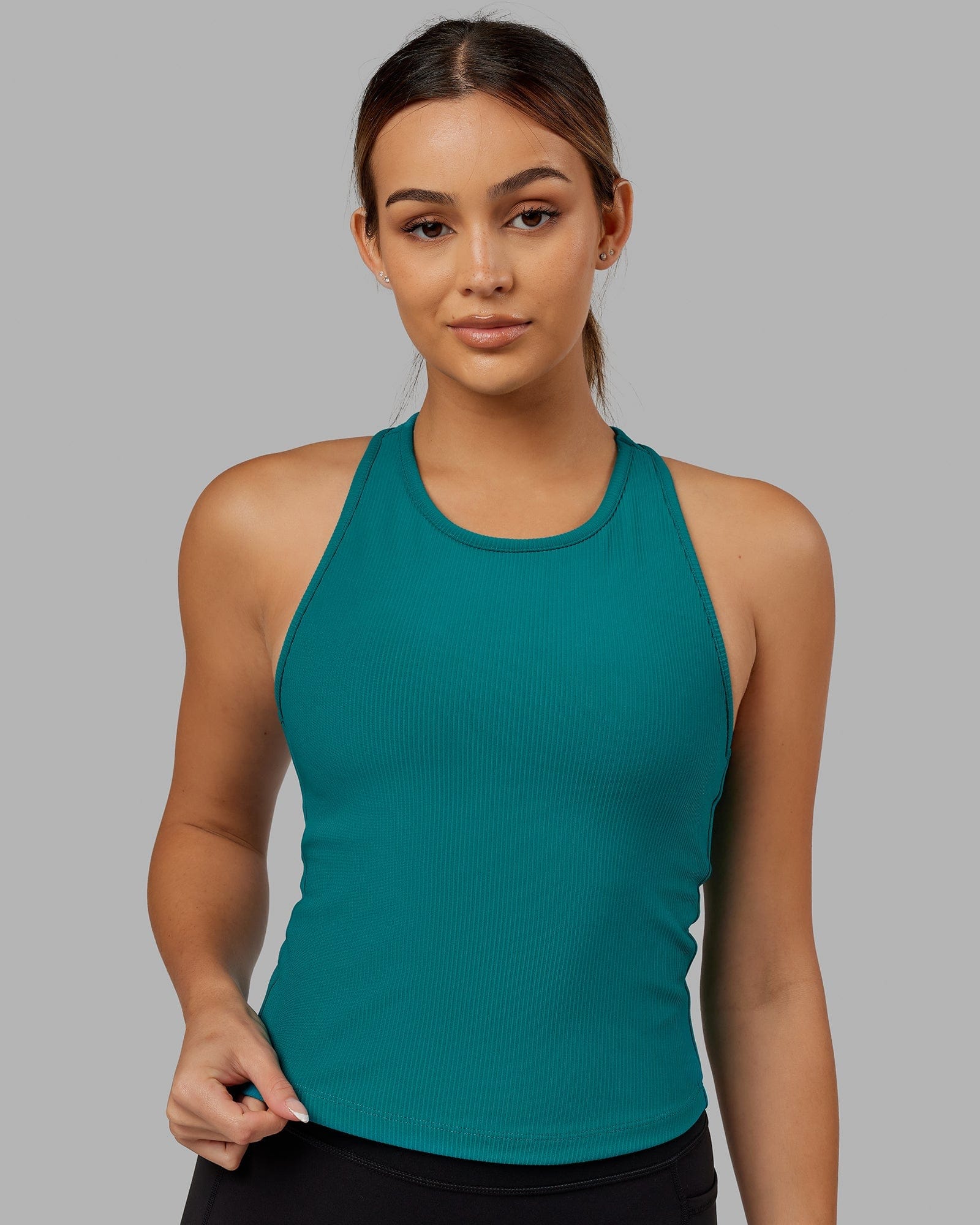 Model wearing Flow Ribbed Shelf Bra Performance Tank - Sea Green