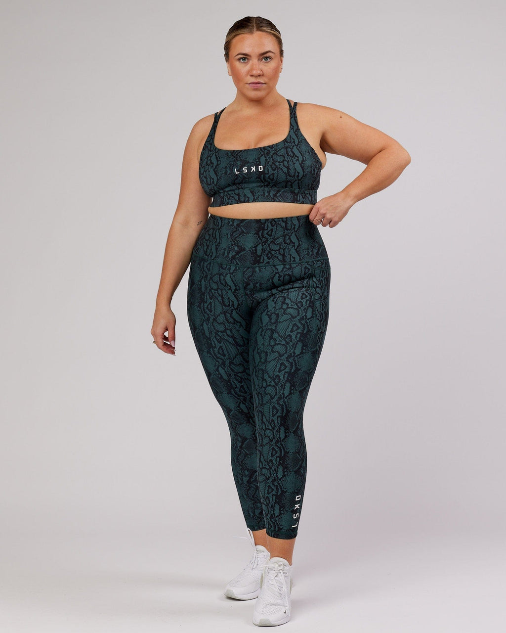 Model wearing Flux 7/8 Length Tight - Forest Snakeskin