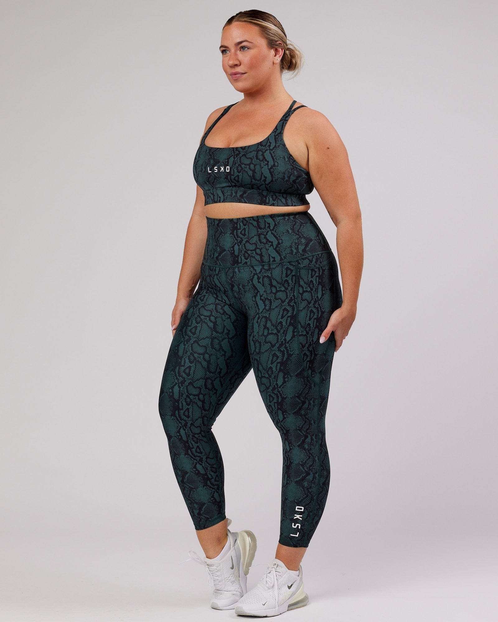 Model wearing Flux 7/8 Length Tight - Forest Snakeskin