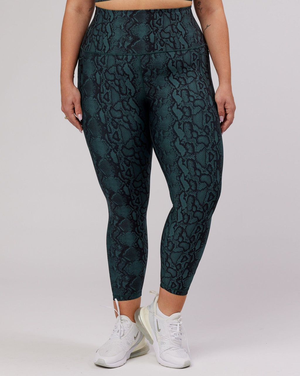 Model wearing Flux 7/8 Length Tight - Forest Snakeskin