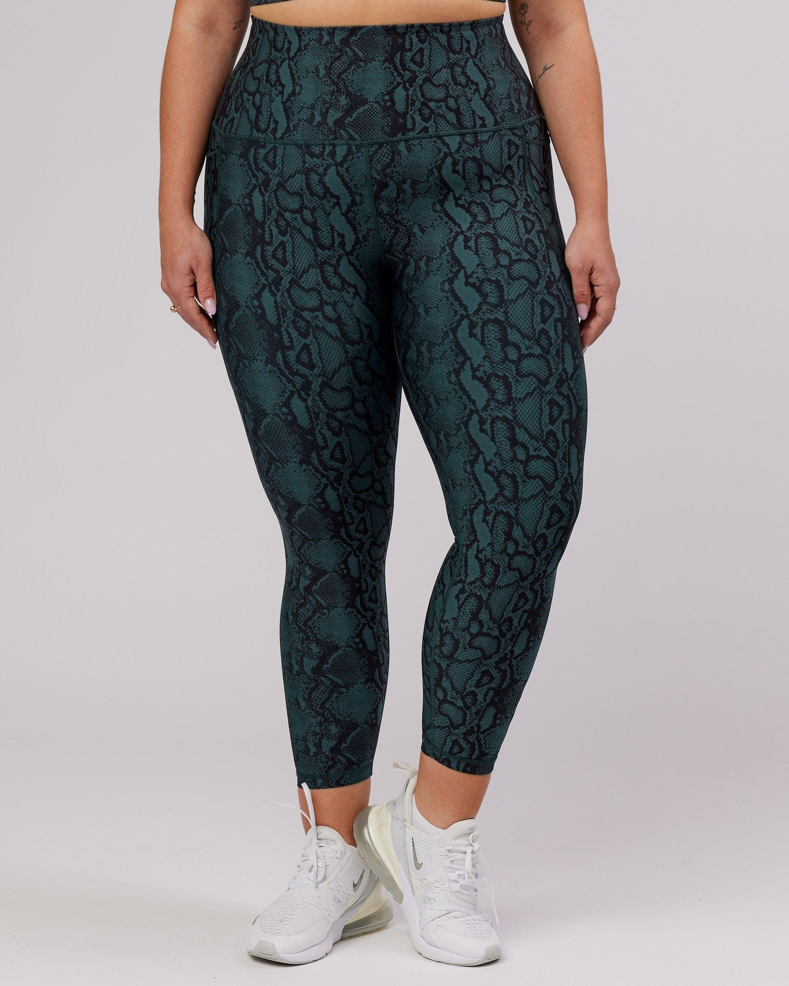 Model wearing Flux 7/8 Length Tight - Forest Snakeskin