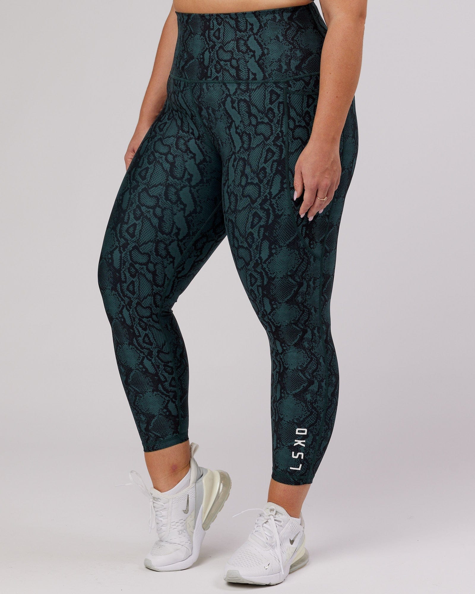 Model wearing Flux 7/8 Length Tight - Forest Snakeskin