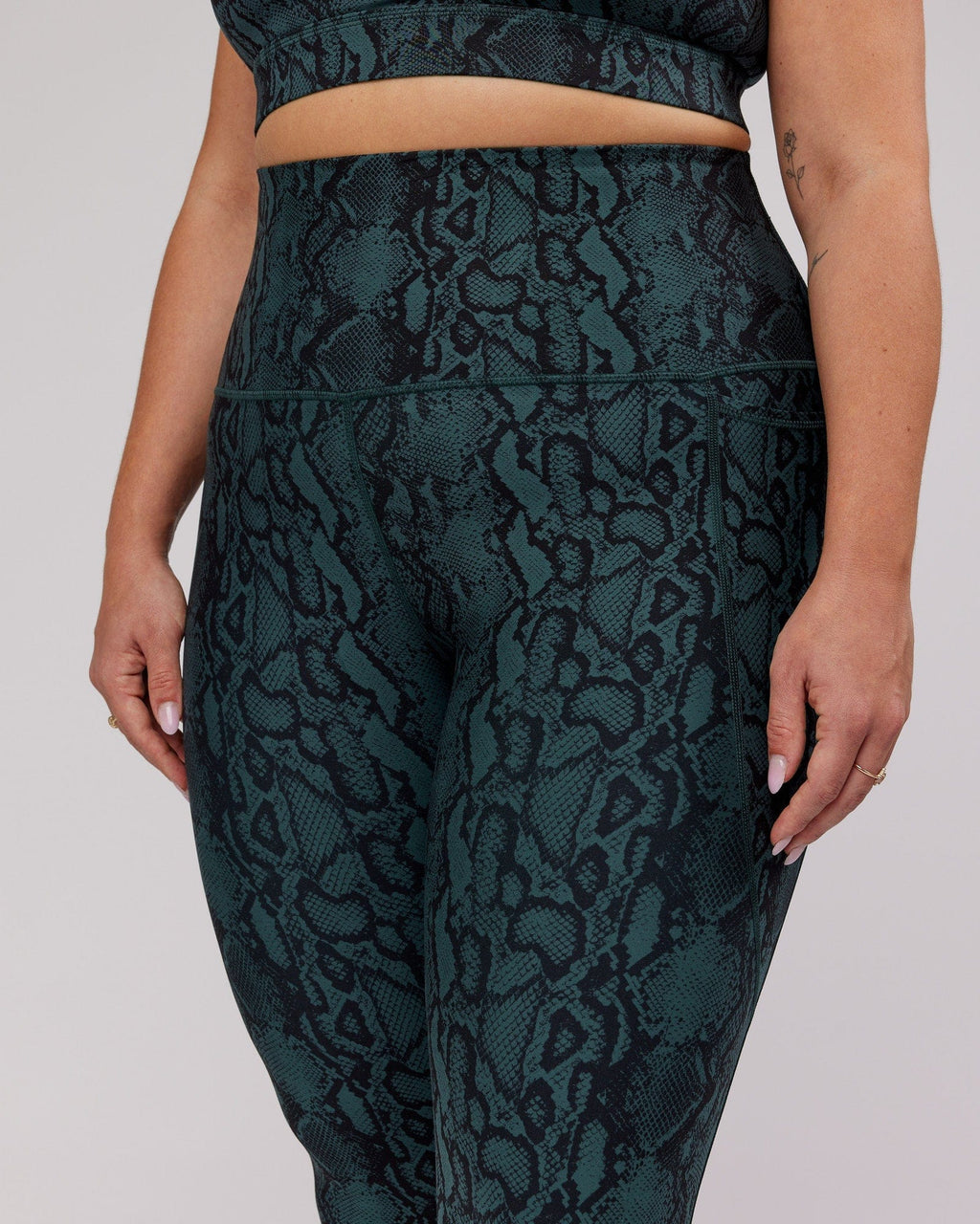 Model wearing Flux 7/8 Length Tight - Forest Snakeskin