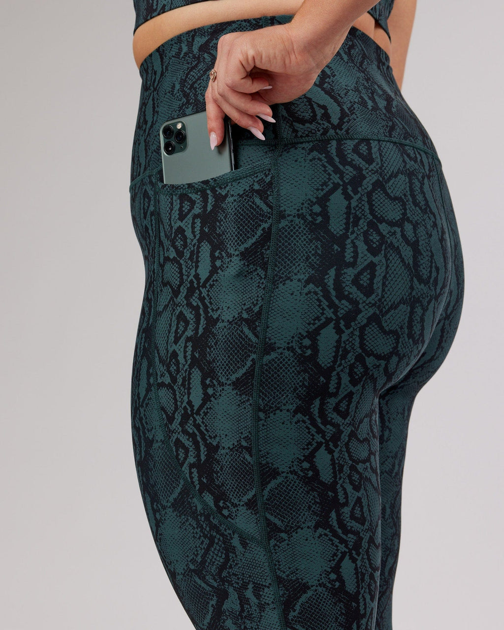 Model wearing Flux 7/8 Length Tight - Forest Snakeskin