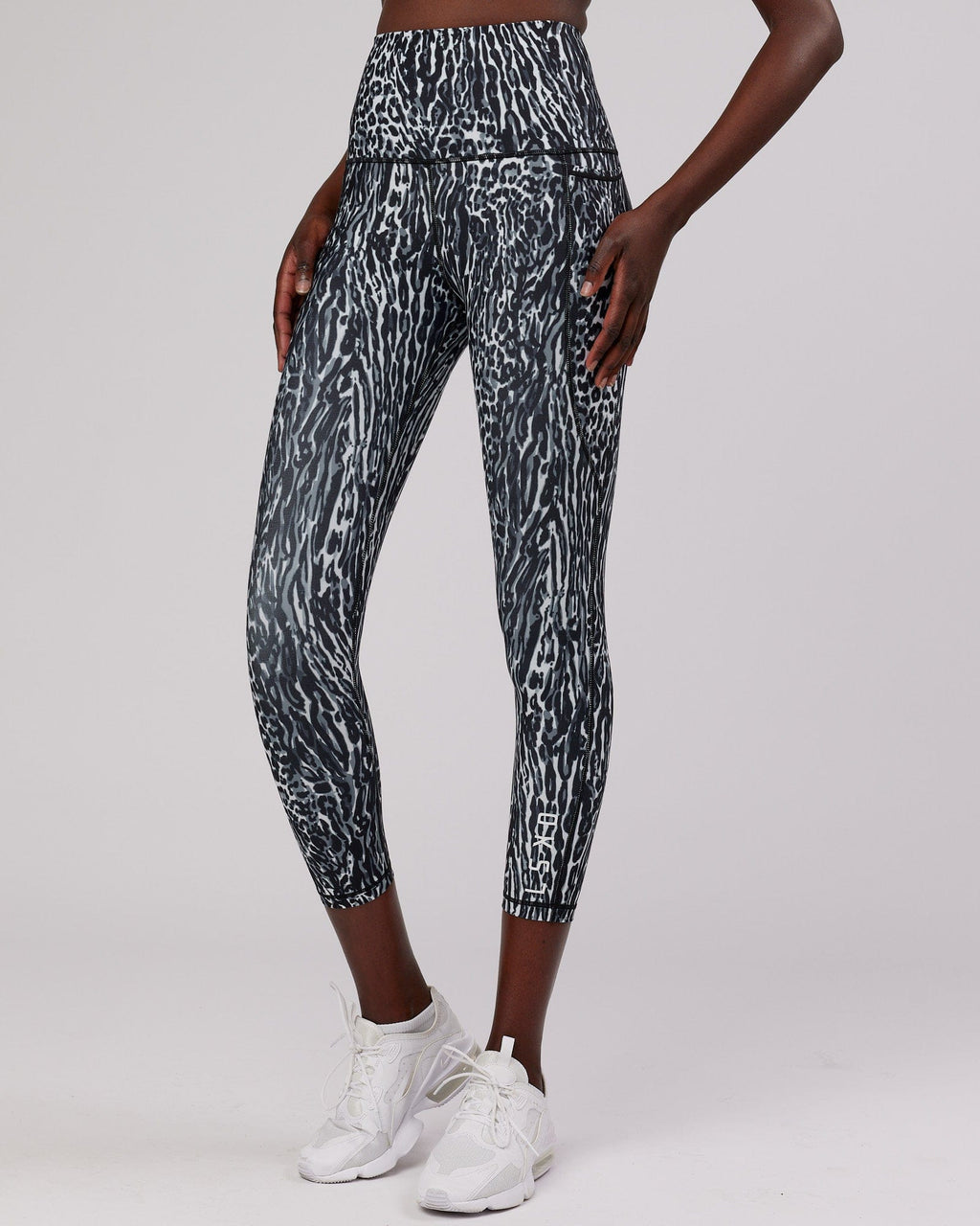 Model wearing Flux 7/8 Length Tight -  Night Leopard