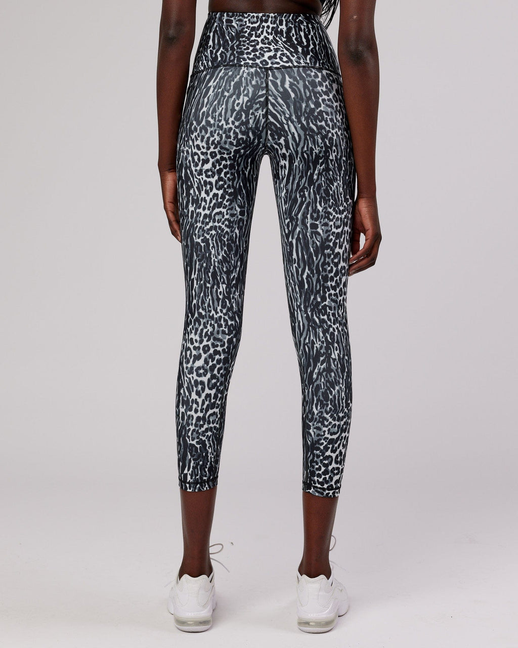 Model wearing Flux 7/8 Length Tight -  Night Leopard