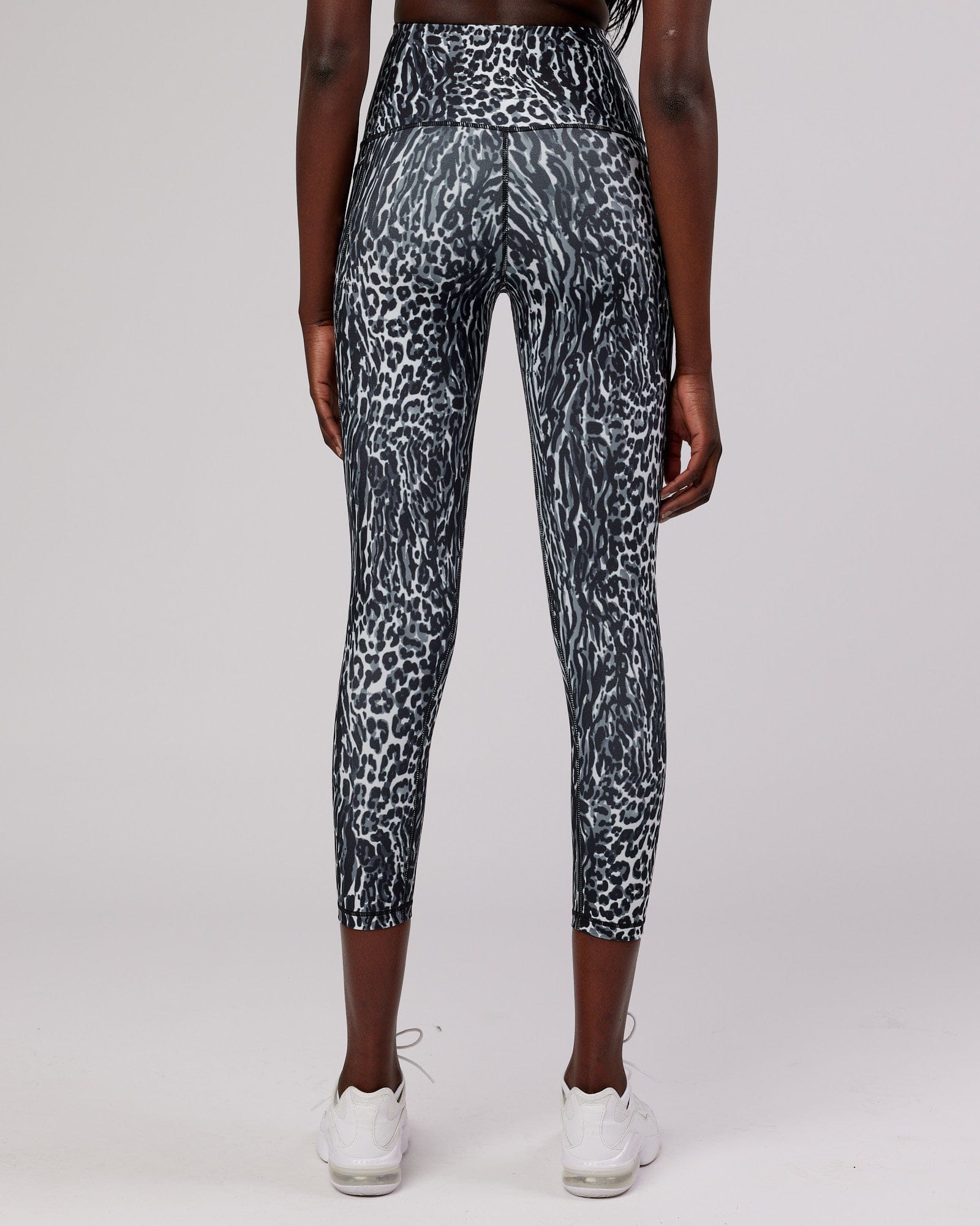 Model wearing Flux 7/8 Length Tight -  Night Leopard