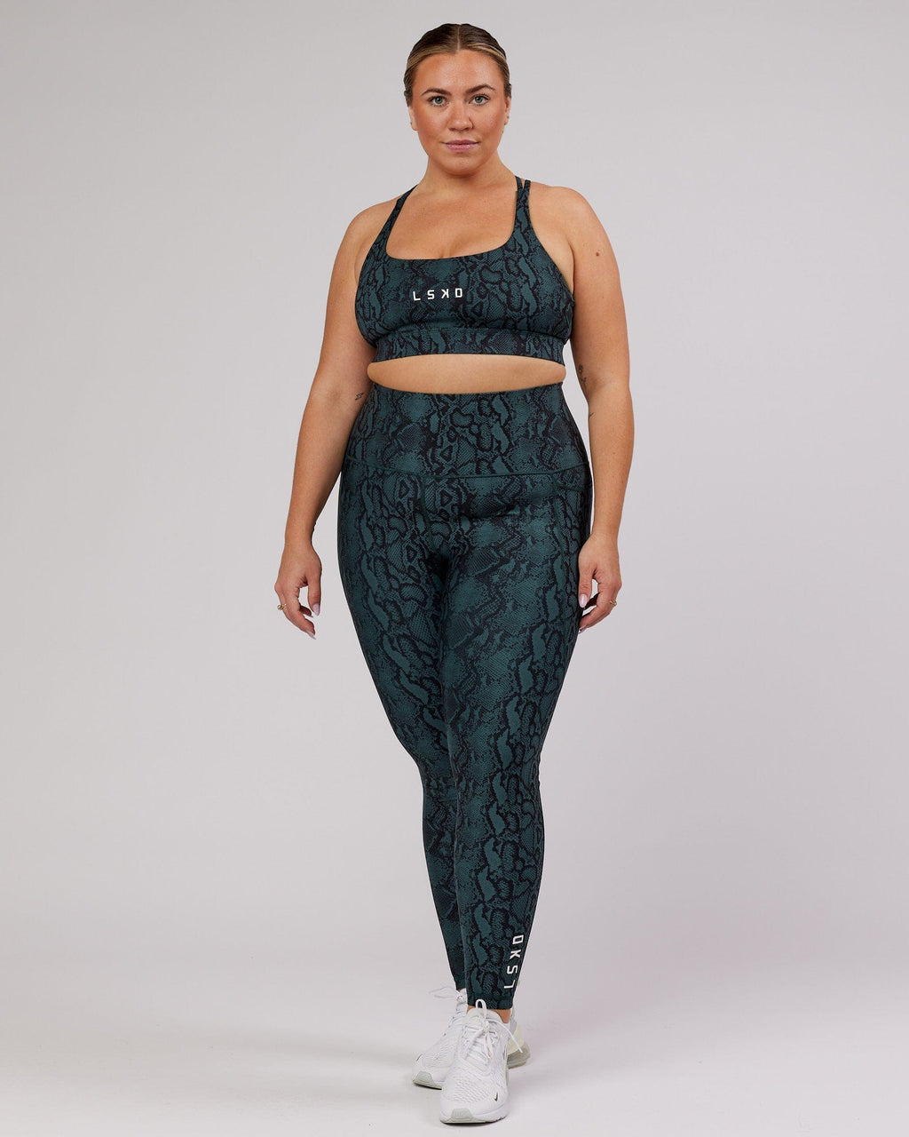 Model wearing Flux Full Length Tight - Forest Snakeskin