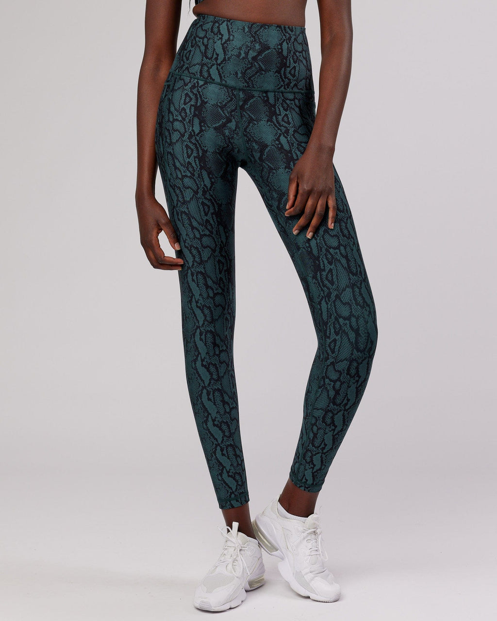 Model wearing Flux Full Length Tight - Forest Snakeskin