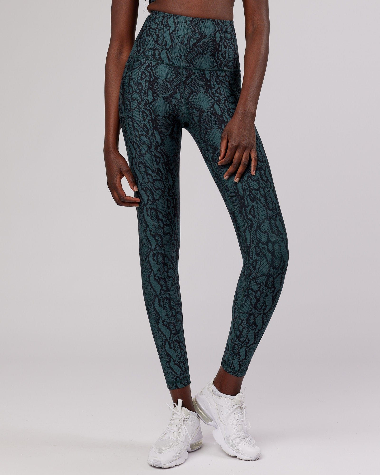 Model wearing Flux Full Length Tight - Forest Snakeskin