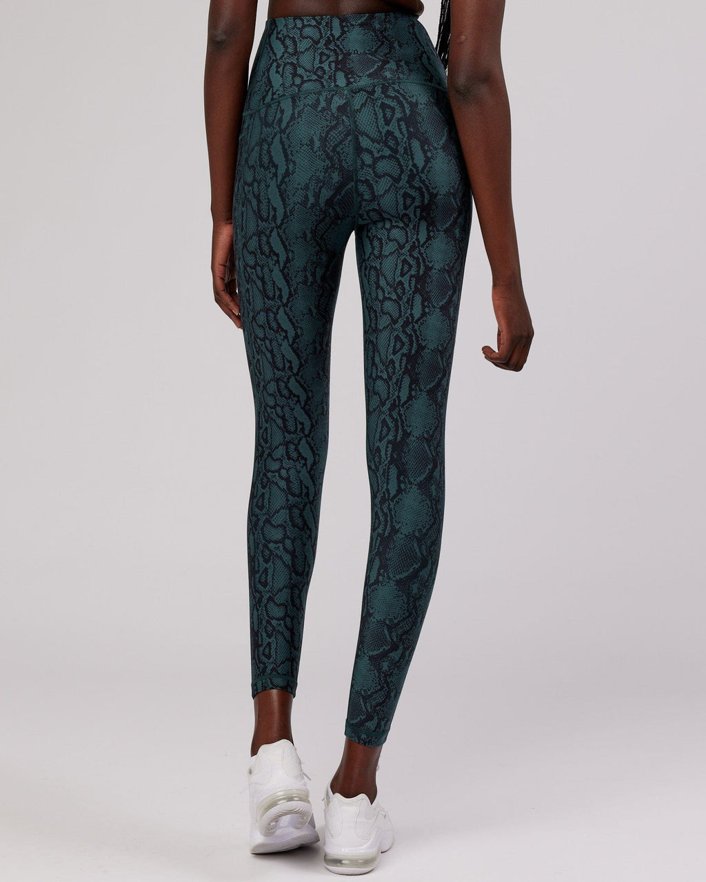 Model wearing Flux Full Length Tight - Forest Snakeskin